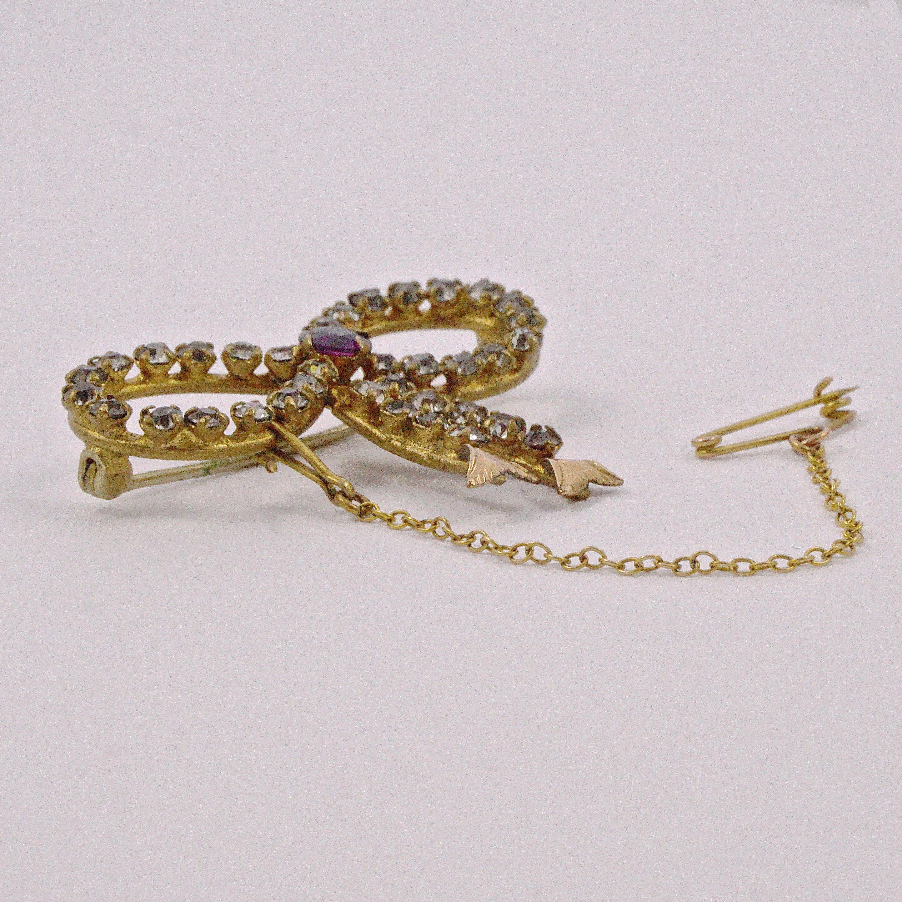Antique Gold Tone Amethyst and Clear Paste Bow Brooch circa 1910 For Sale 4