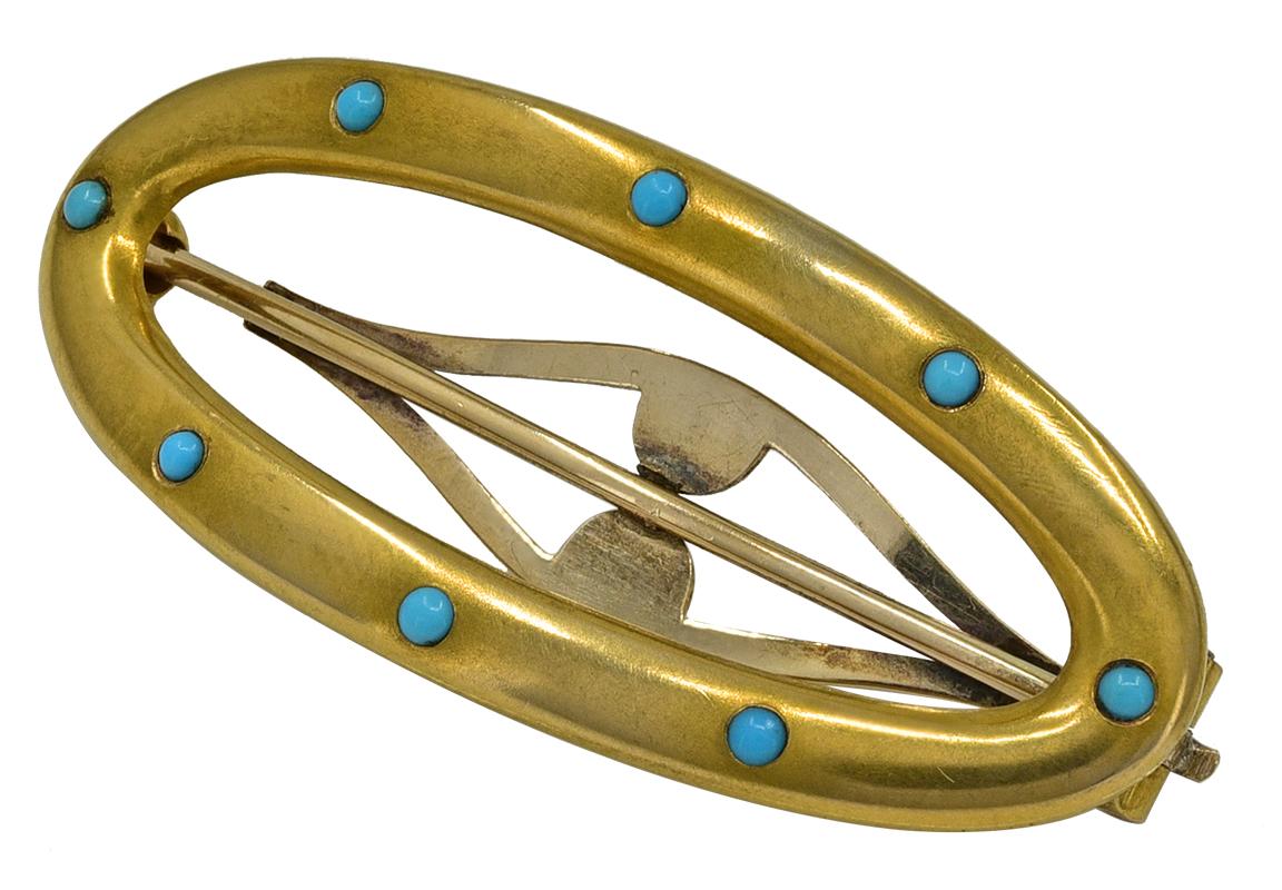 Lovely antique barrette.   Softly luminous 14K yellow gold, set with eight turquoise cabochons.  1 3/4