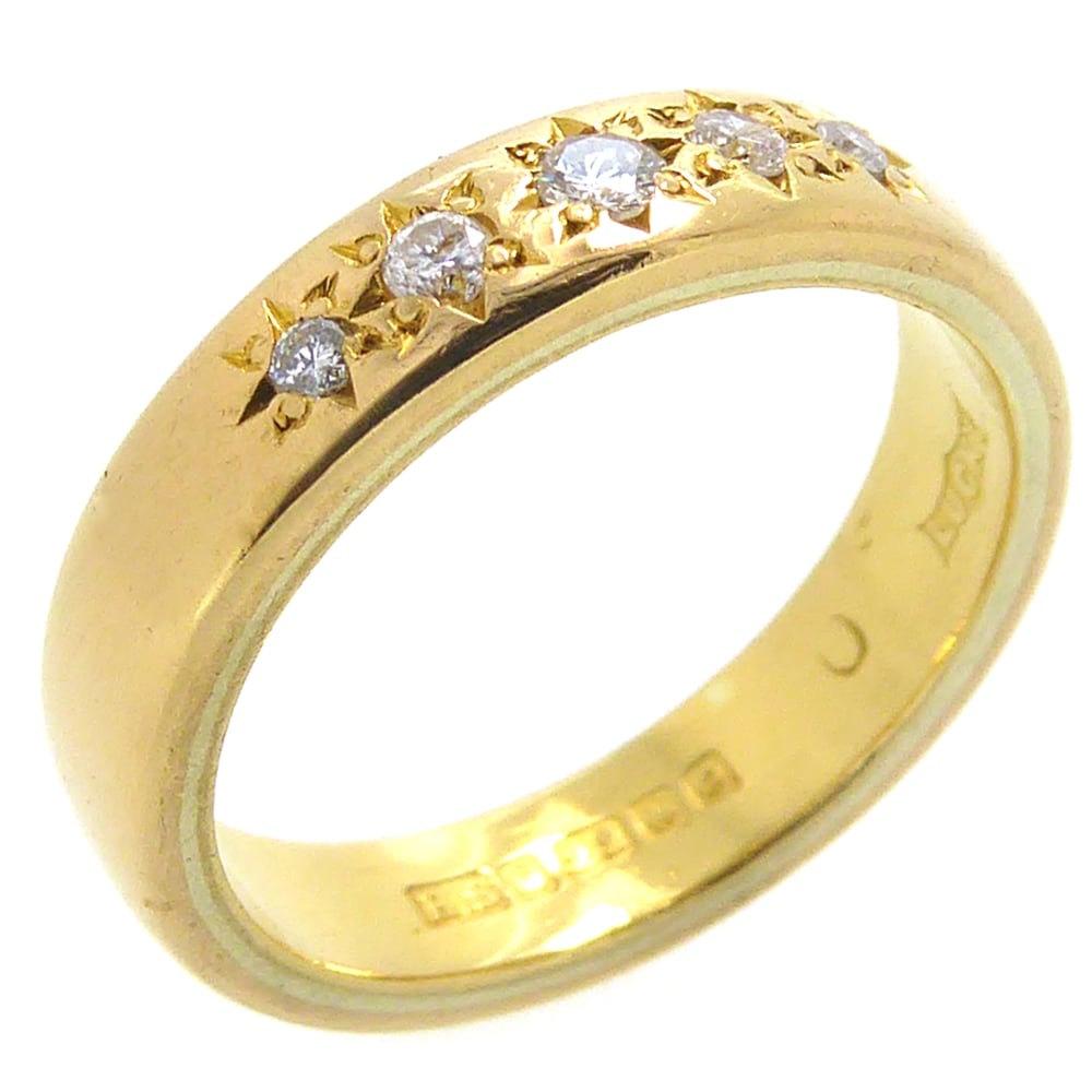 Old gold is such a beautiful warm color, and never more so when it has the tones of 22ct and, so, the only improvement that could have been made to this gold ring was to add diamnds. And that's just what some clever jeweller did at the beginning of