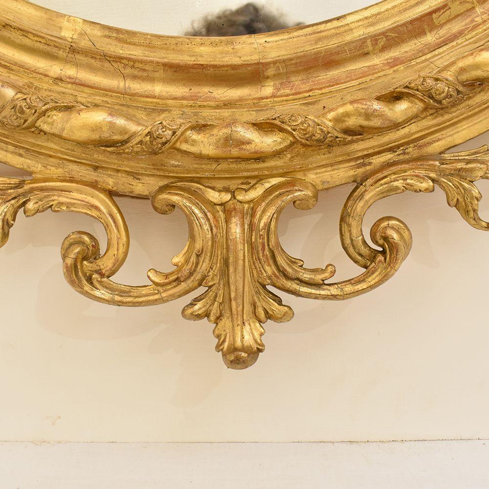 Antique Golden Mirror, Oval Wall Mirror, Gold Leaf Frame, XIX Century In Good Condition In Breganze, VI