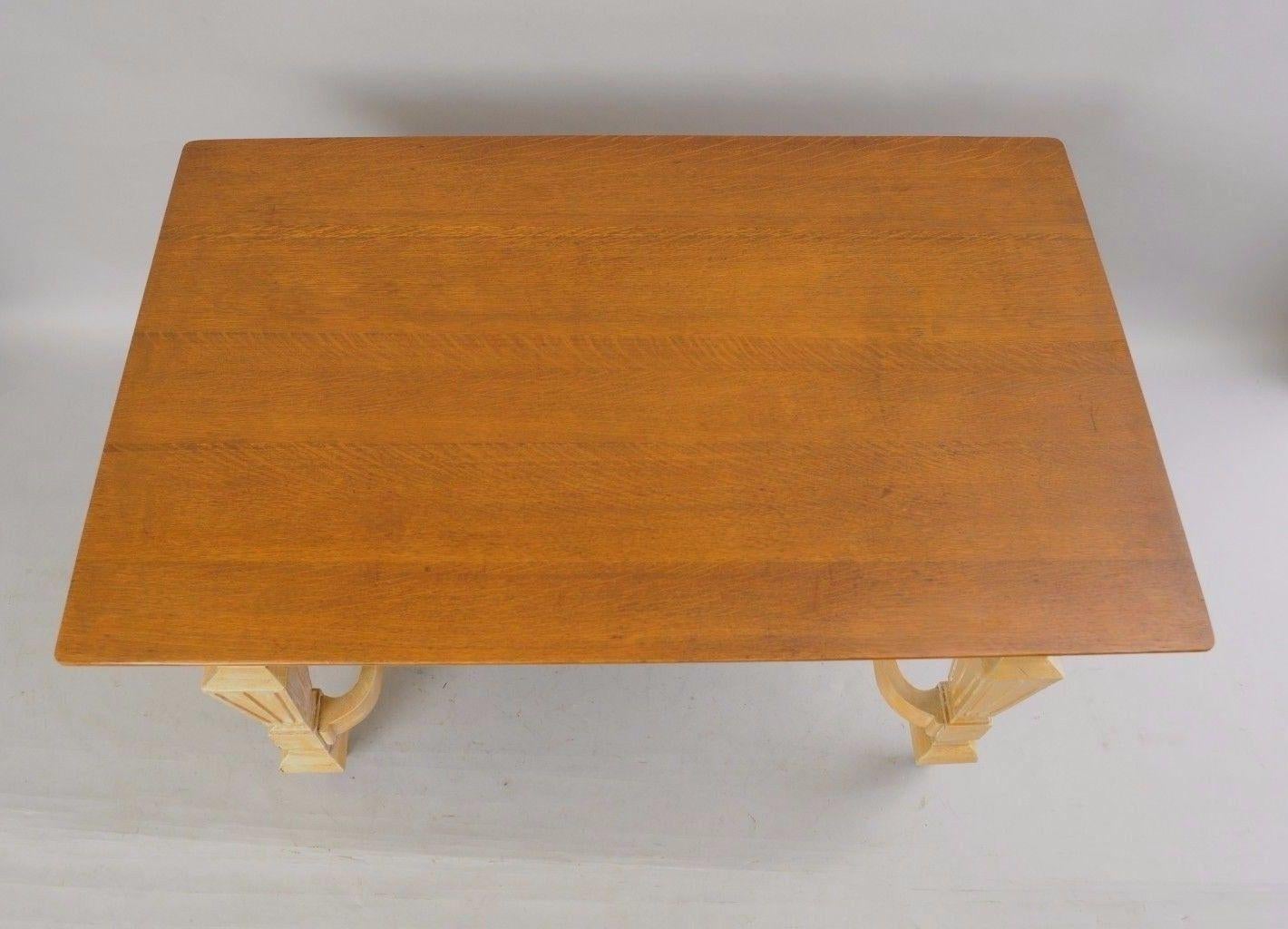 Antique Mission golden oak table with one drawer. Item features solid oakwood construction, single drawer, lower shelf, brass hardware, golden oak top with beautiful wood grain, finished back, solid wood base with attractive yellow 