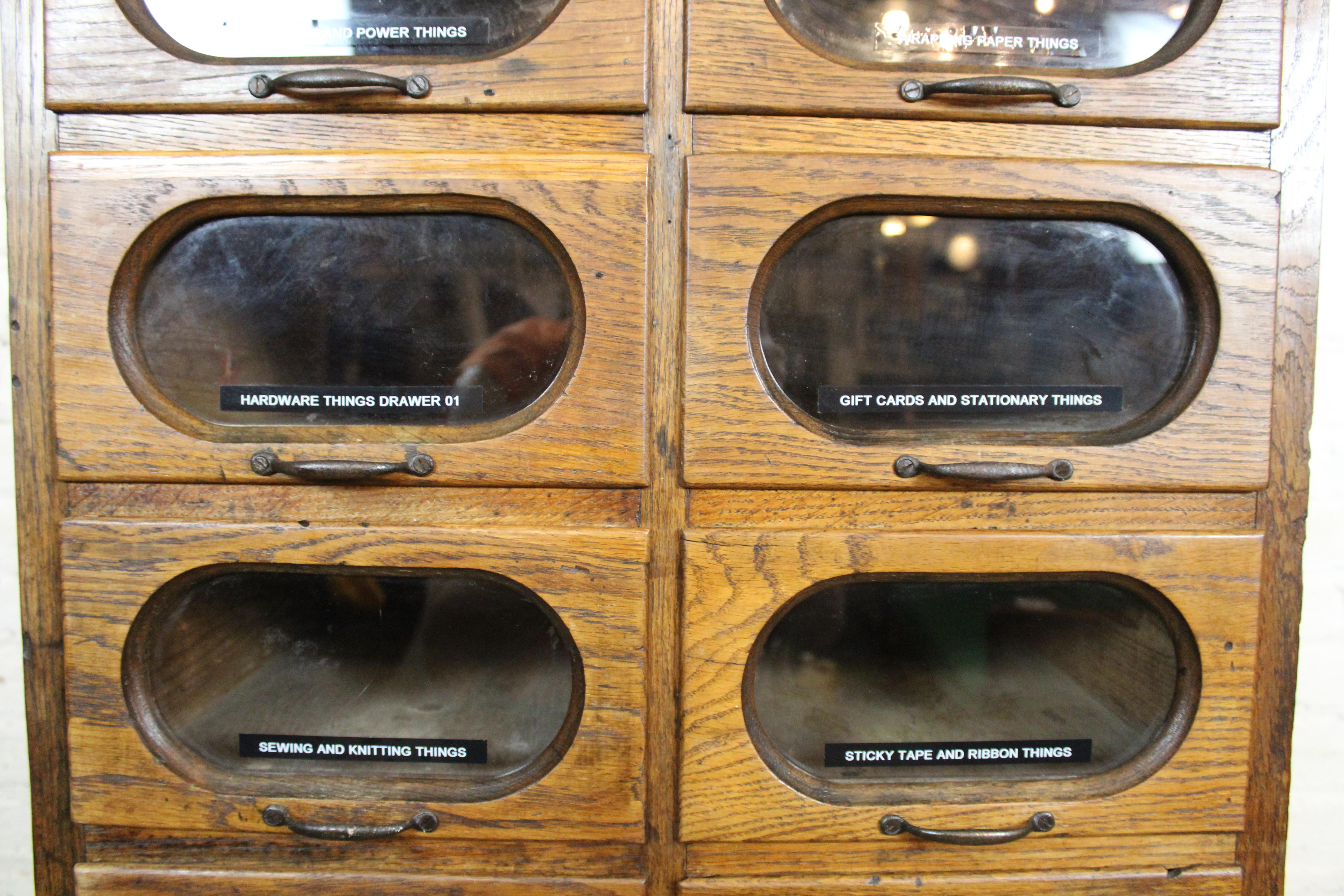 Carved Antique Golden Oak Haberdashery Cabinet by Dudley & Co. England