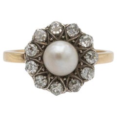 Antique Golden Ring with Pearl and Diamonds, circa 1900s.