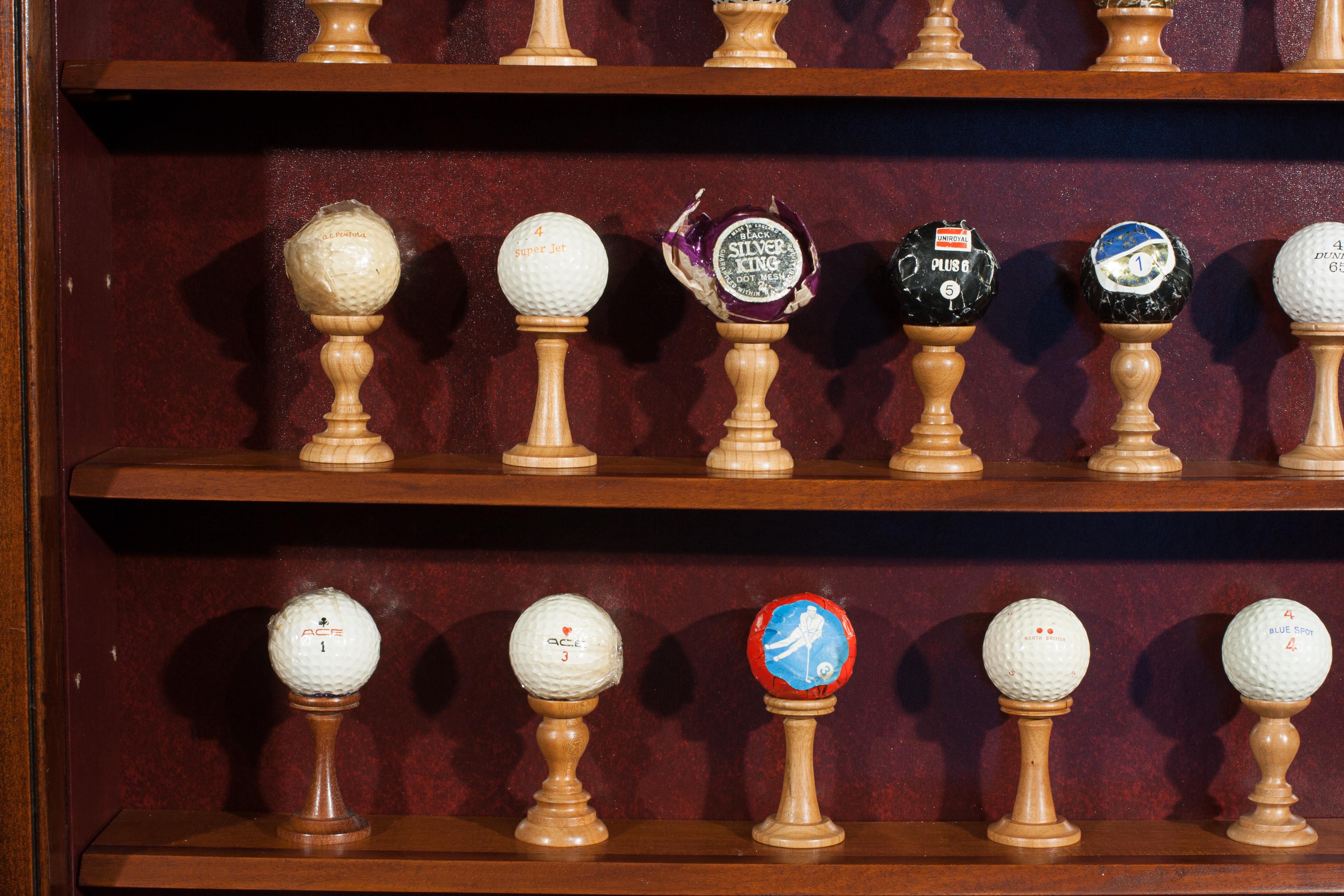 Antique Golf Ball Collection from 1890 - 1960 in Cabinet 4