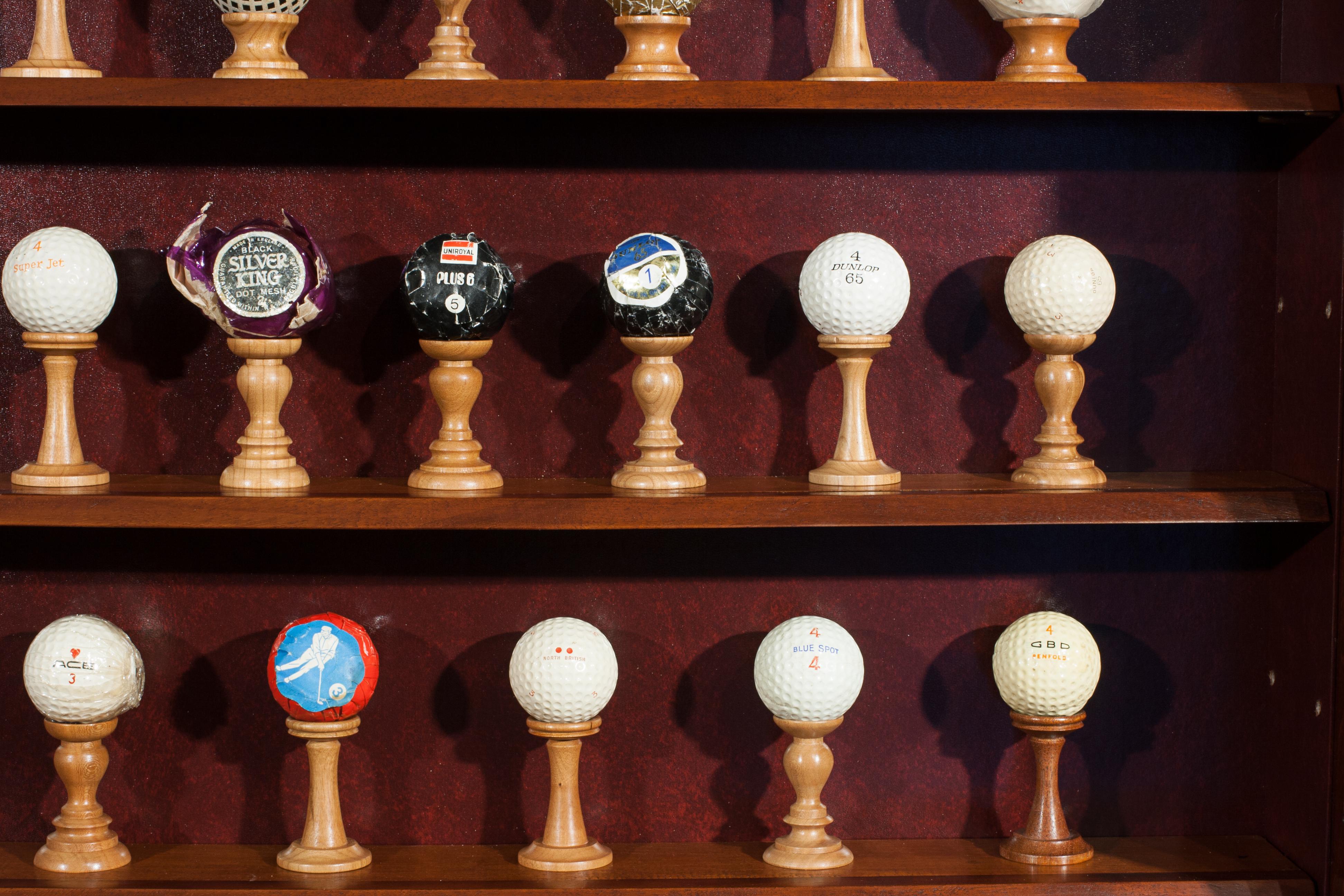 Antique Golf Ball Collection from 1890 - 1960 in Cabinet 5