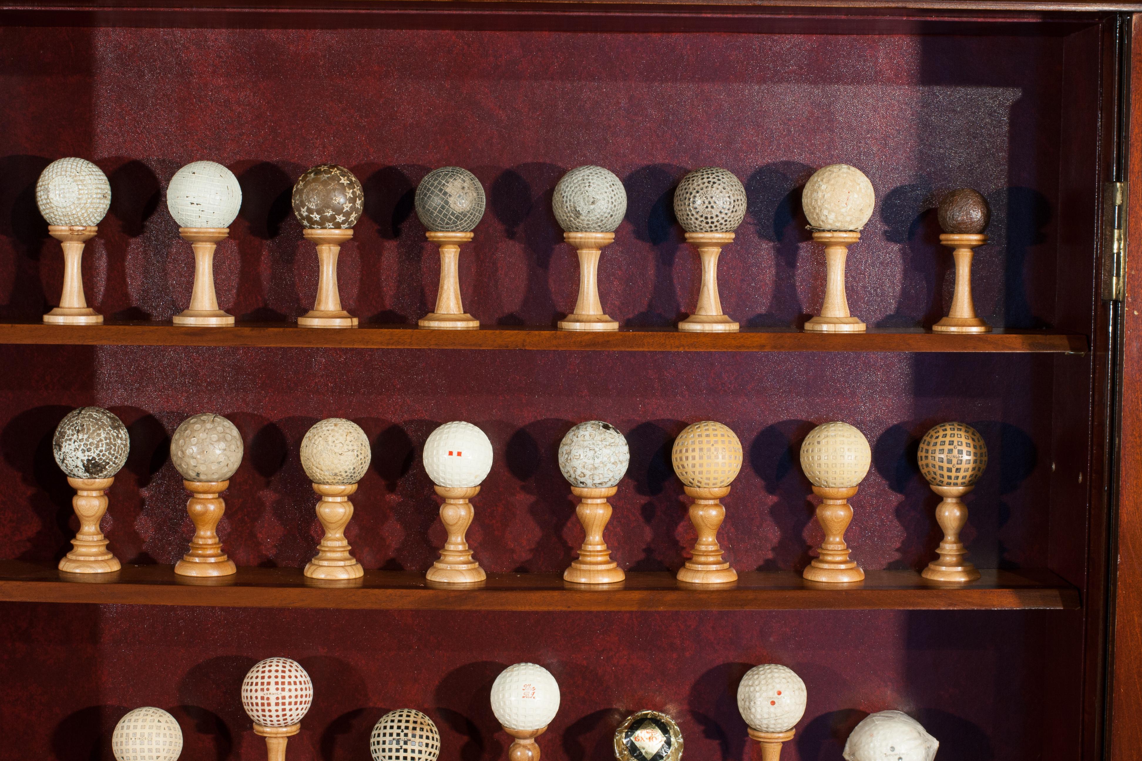 20th Century Antique Golf Ball Collection from 1890 - 1960 in Cabinet