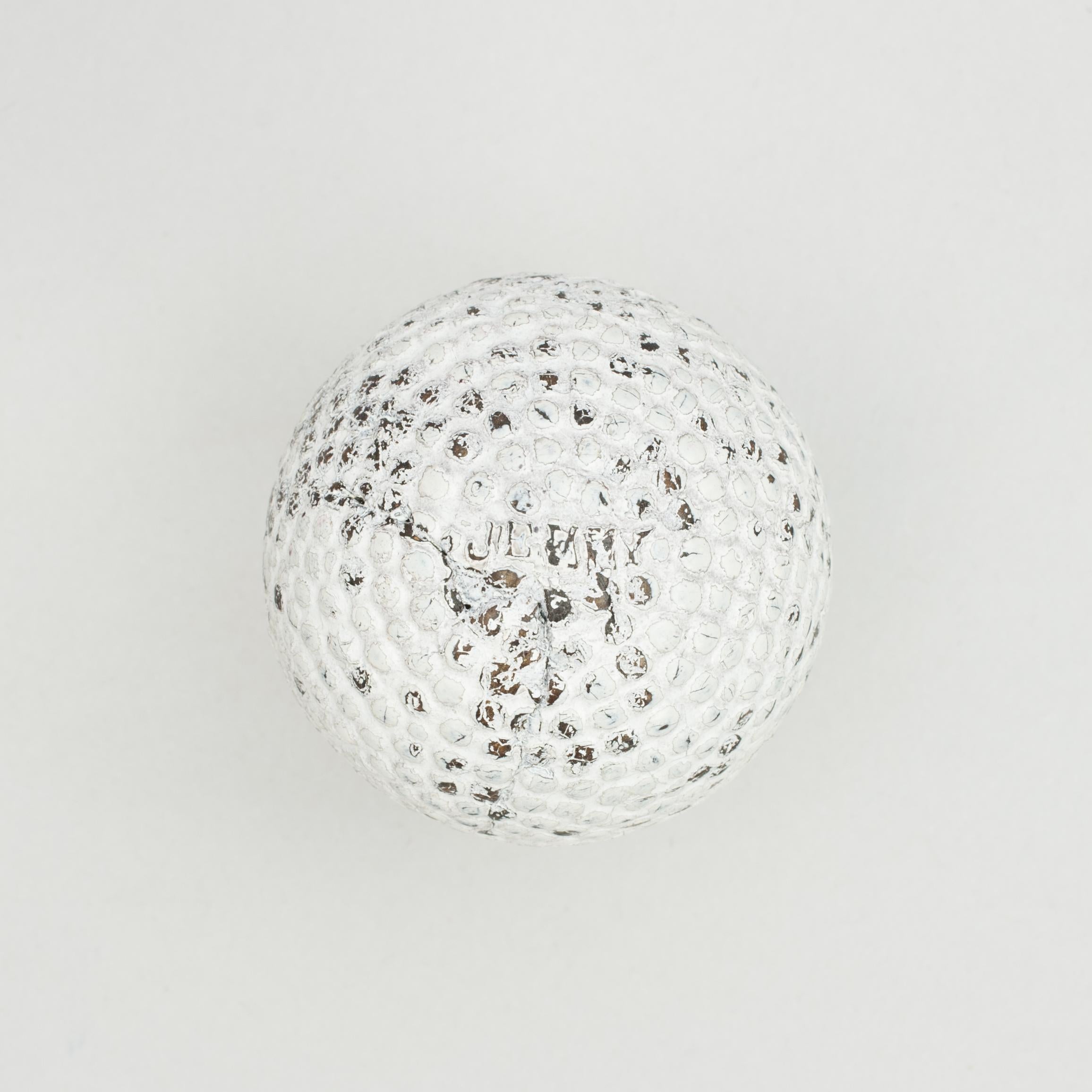 Bramble Pattern Golf Ball, Jenny.
A rare example of a bramble patterned golf ball. The golf ball is in good condition and is marked 'JENNY' on both poles. It is not the usual classic bramble pattern, they appear to be more circular on all four