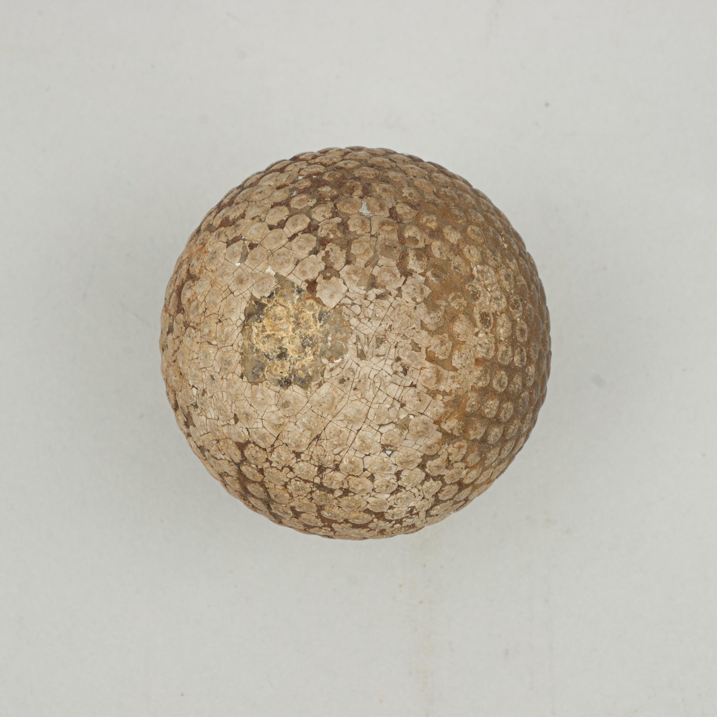 Patent Bramble pattern golf ball by St. Mungo.
A good example of 'The Colonel' bramble patterned rubber core golf ball. The golf ball is in good condition and is manufactured by St. Mungo Manufacturing Co. of America, Newark, New Jersey and