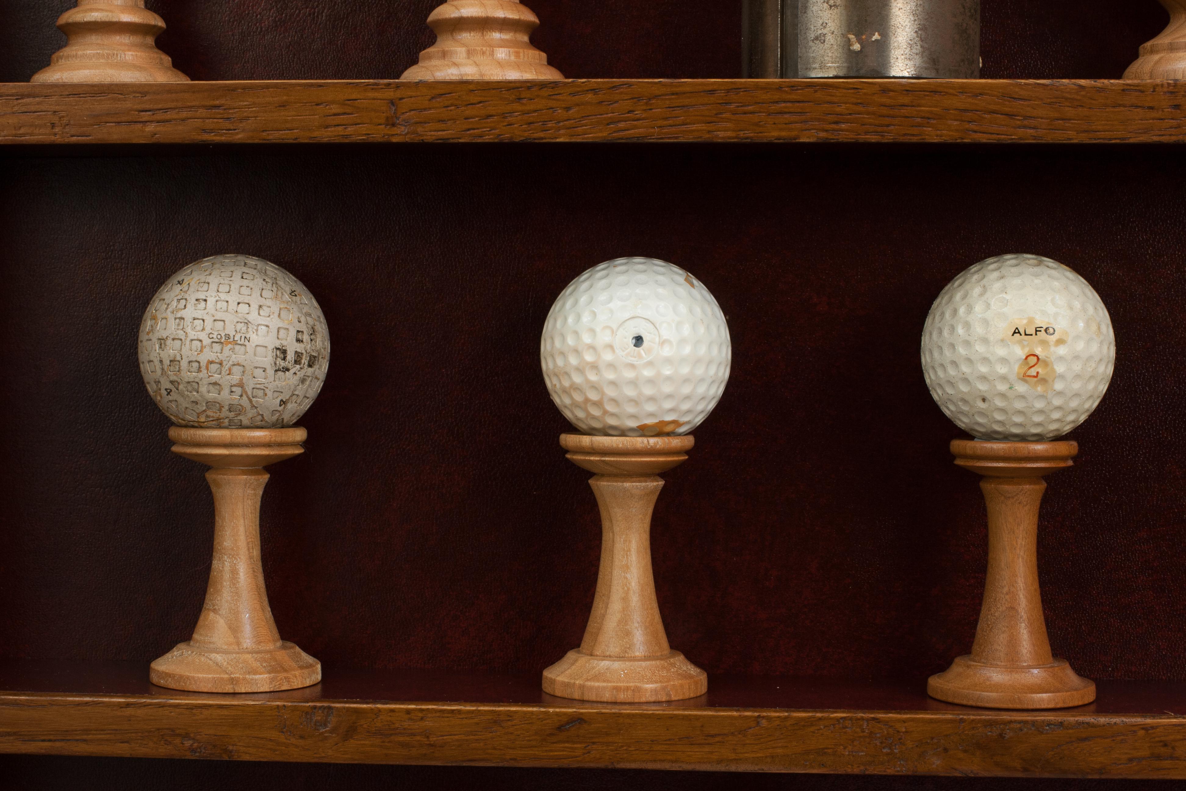 Pelotas de golf antiguas en vitrina en venta 11