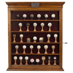 Used Golf Balls In Display Cabinet