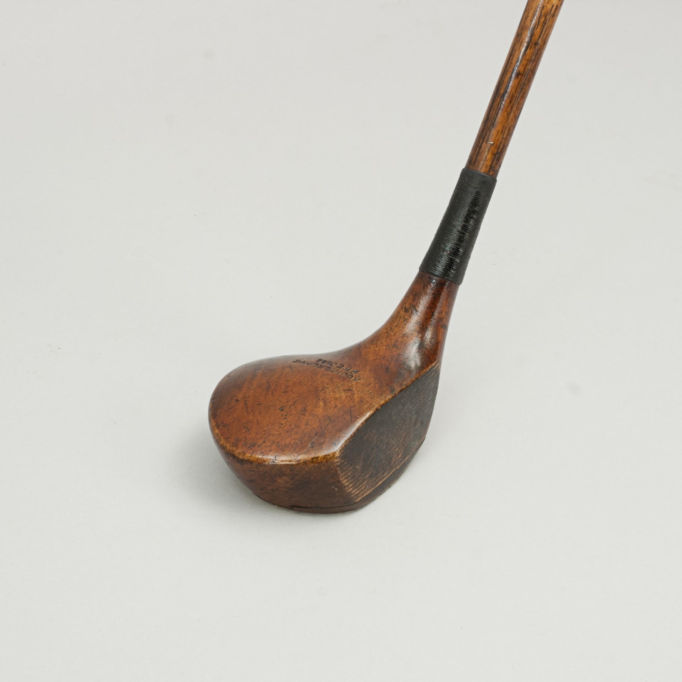 Antique Golf Club, Auchterlonie special
Persimmon head Auchterlonie socket head brassie with hickory shaft and replaced suede leather grip. The head stamped 'Auchterlonie Special', the original shaft stamped 'Auchterlonie, St Andrews'. The club
