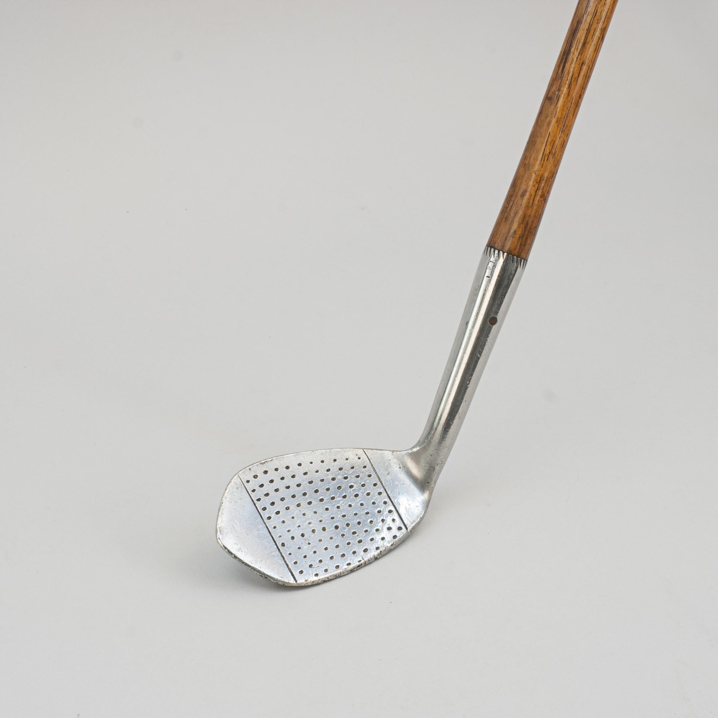 Vintage Hickory Golf Club, Pitcher, St Andrews.
A fine and nicely weighted dot punched faced pitcher by D. Anderson & Sons, St Andrews. The rear of the club head marked 'Premier Rustless, Monarch Pitcher, D. Anderson & Sons, St Andrews, Special,
