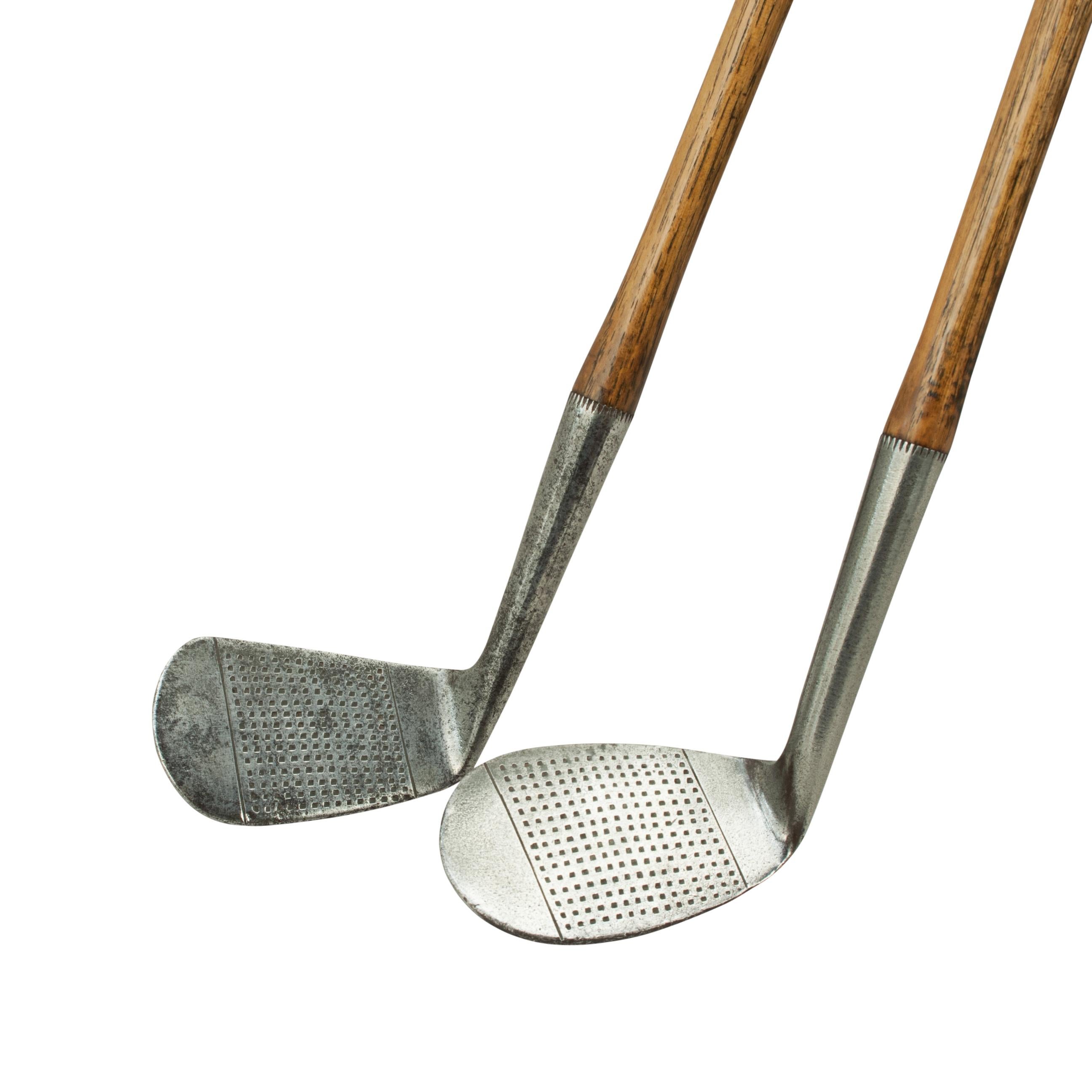 Pair of Hickory Golf Clubs, J.H. Taylor Autograph Irons. 
A pair of J.H. Taylor hickory shafted golf clubs, a Mashie and Niblick. The club heads stamped 'Cann & Taylor, Warranted Hand Forged, with J. H.Taylor 'Autograph' with the Reg. No.