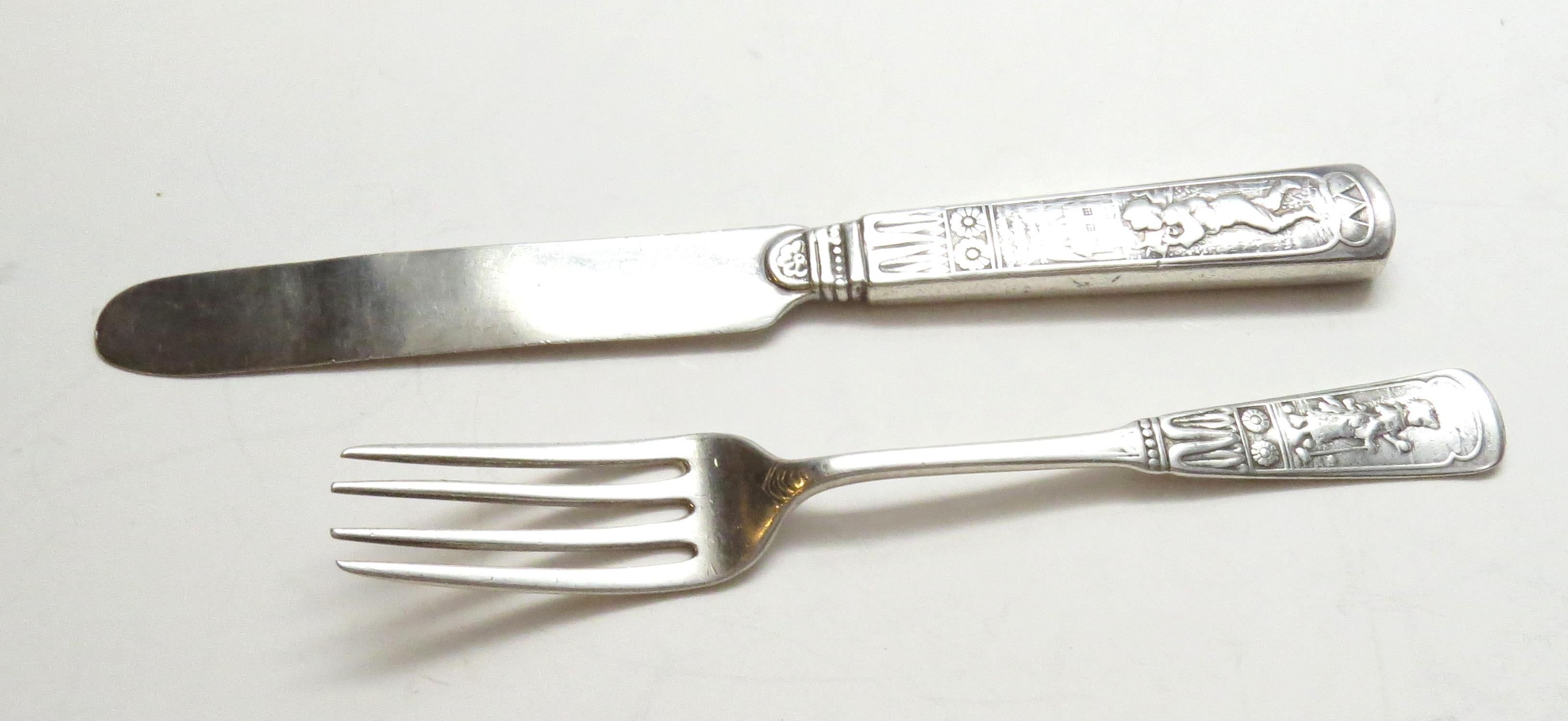 Antique Gorham Sterling silver youth fork and knife in the 1880 Piper pattern. 
Engraved on back of handle appears to be: John Condon (London) Jr. 
Marked: lion anchor G, PAT.82, STERLING.
 Knife: 7 1/8