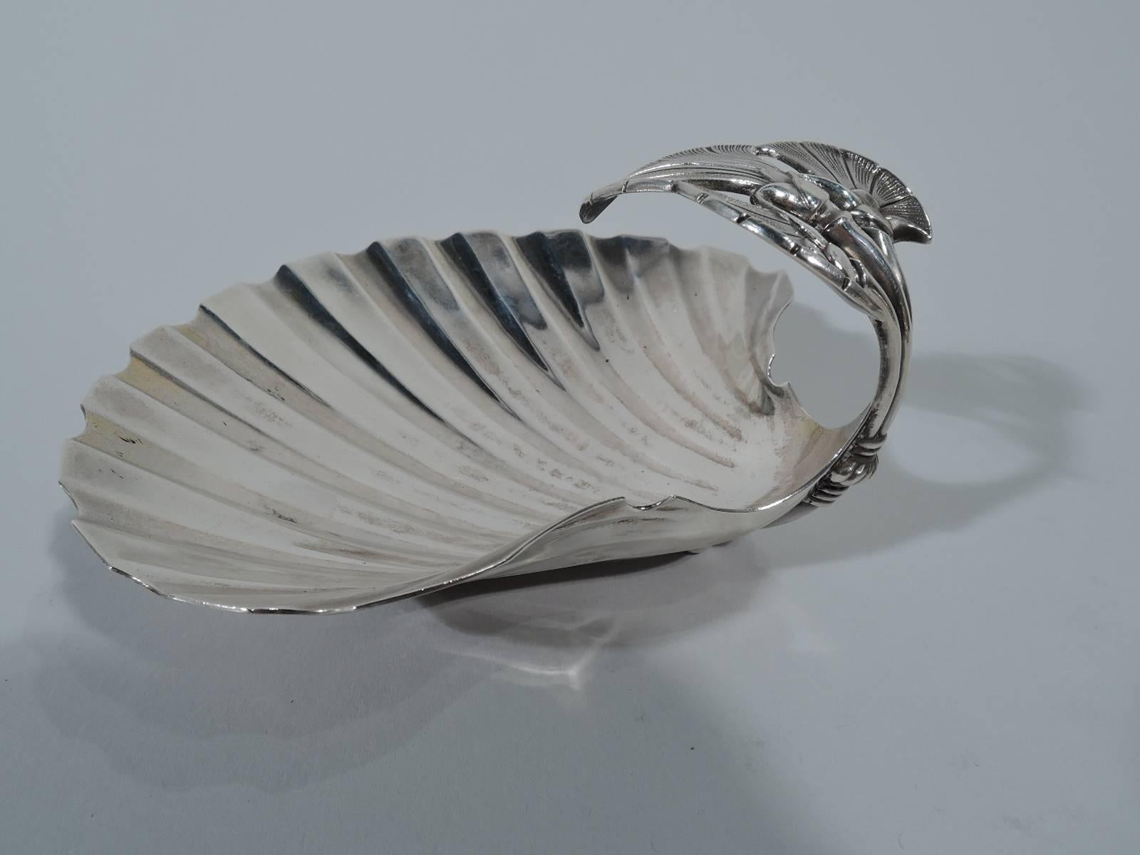Aesthetic sterling silver scallop shell. Made by Gorham in Providence in 1869. Fluted bowl with stylized and engine-turned leaf handle and two seashell supports. Hallmark includes no. 65 and date letter. Weight: 4.2 troy ounces.