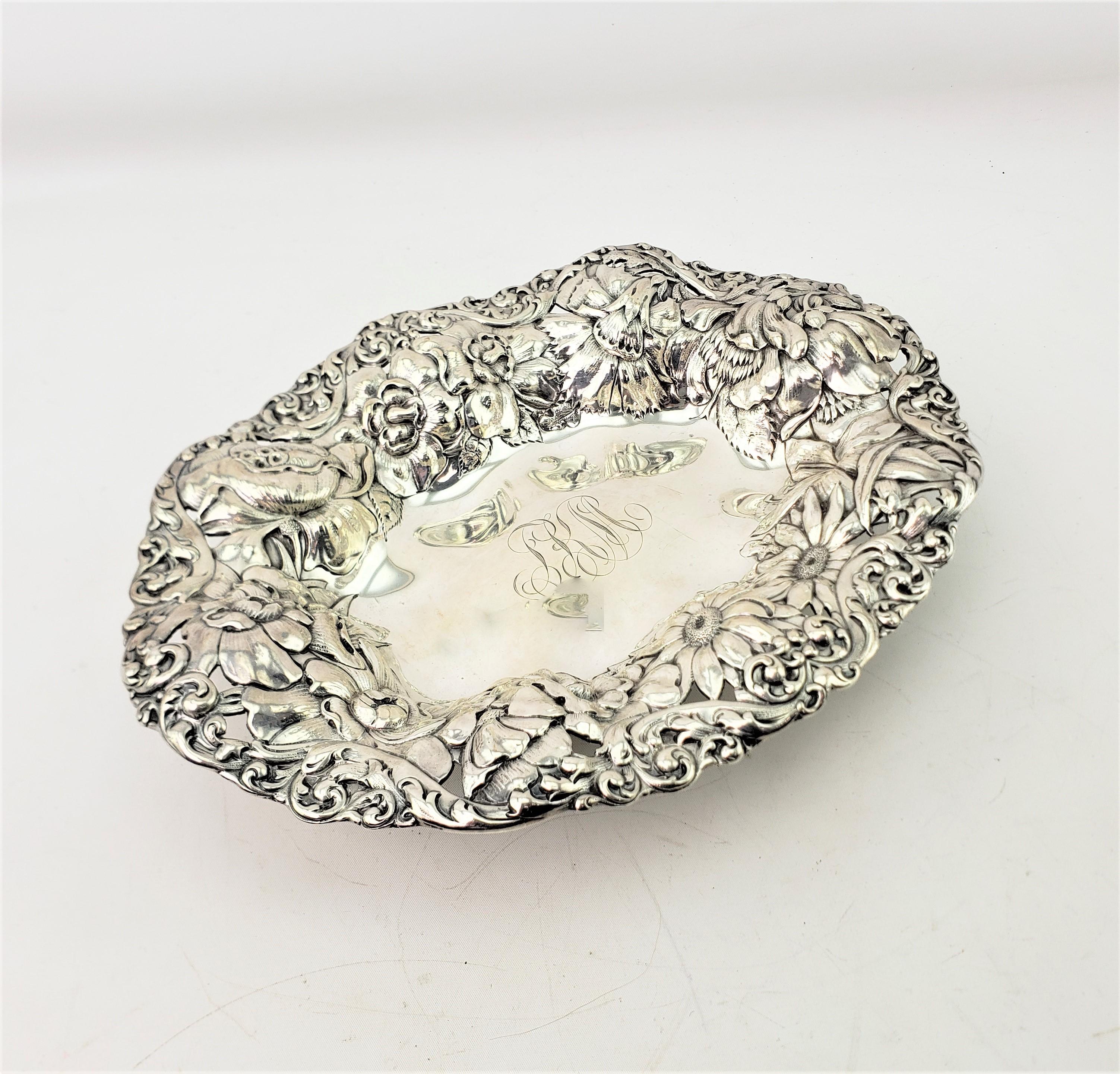 This antique and very ornate bowl was made by the renowned Gorham Company of the United States and dates to approximately 1890 and done in the period Art Nouveau style. The bowl is composed of sterling silver and is quite heavy weighing 670 grams