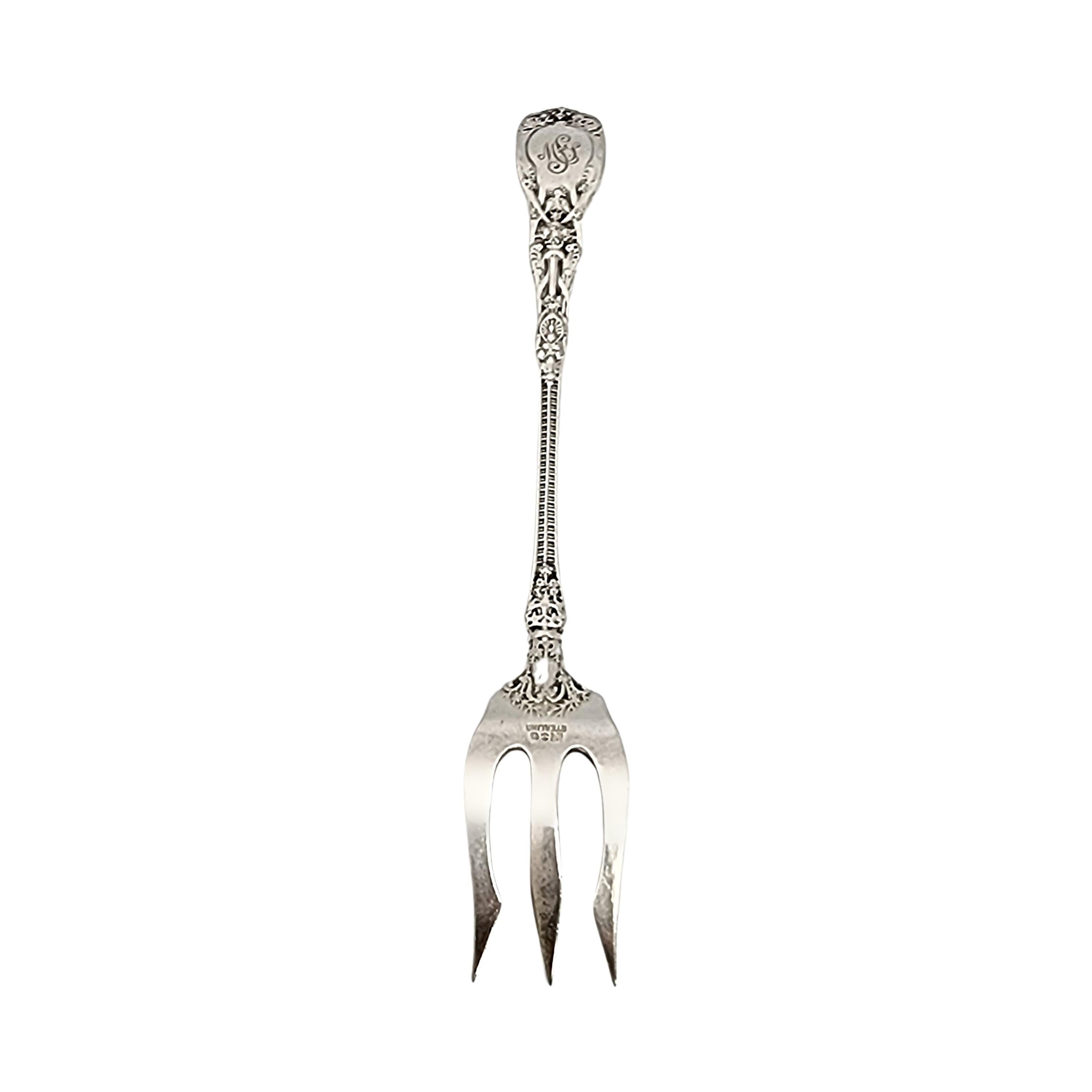 Antique sterling silver olive fork in the Mythologique pattern by Gorham.

Monogram appears to be MSJ (see photo).

Designed by F. Antoine Heller in 1894, Gorham's Mythologique pattern is an intricate, multi-motif pattern that ornately depicts