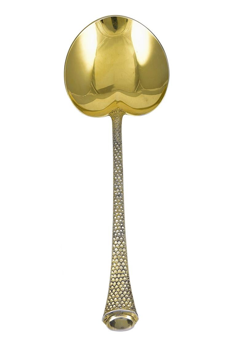 Beautiful dessert service:  sterling silver large spoon and six individual spoons.  Made by GORHAM.  Heavy gauge silver, with gilt bowls and detailing. The handles are fully textured, to look like a 