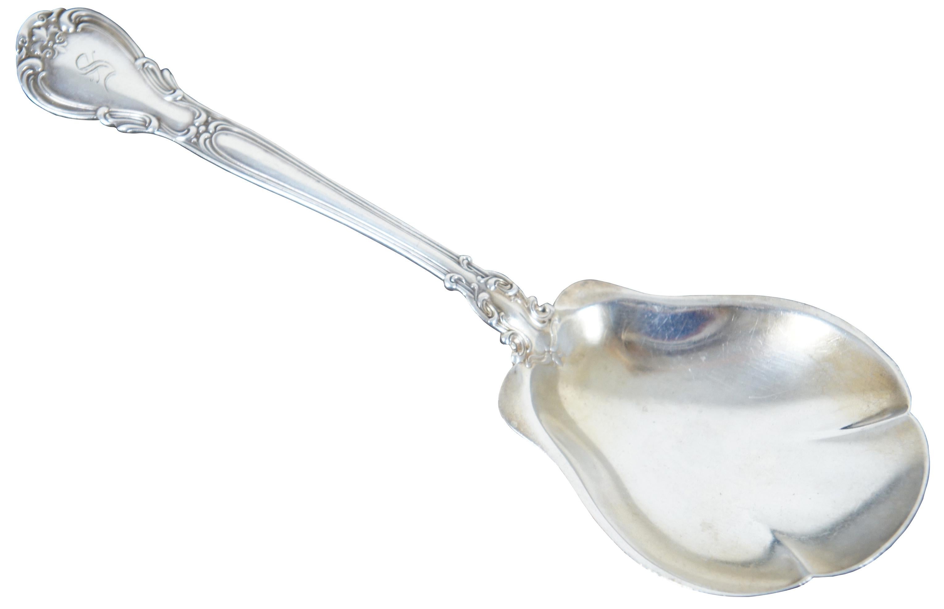 Antique Gorham sterling silver 925 berry / citrus serving spoon in the Chantilly pattern, monogrammed with an S. Measures: 9