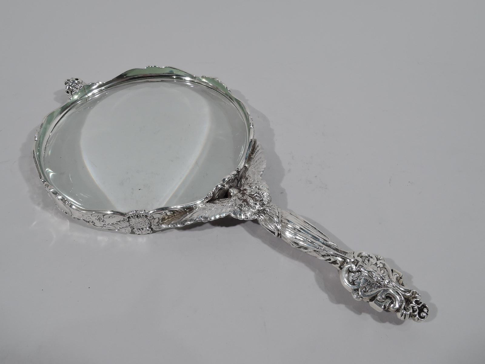 Art Nouveau classical sterling silver magnifying glass. Made by Gorham in Providence, circa 1900. Figural frame in form of drapery-clad Athena, the goddess of wisdom, standing on scroll and ribbon terminal with owl. Her outstretched arms support the