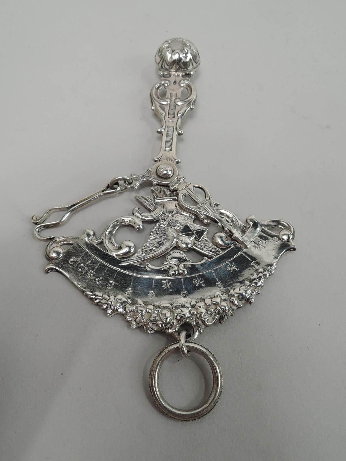 Turn-of-the-century Victorian Rococo sterling silver postage scale. Made by Gorham in Providence. Sweet and romantic with garland, scrolls, and letter-bearing dove. Measures up to 12 ounces of epistolary passion. With loose-mounted ring. Fully