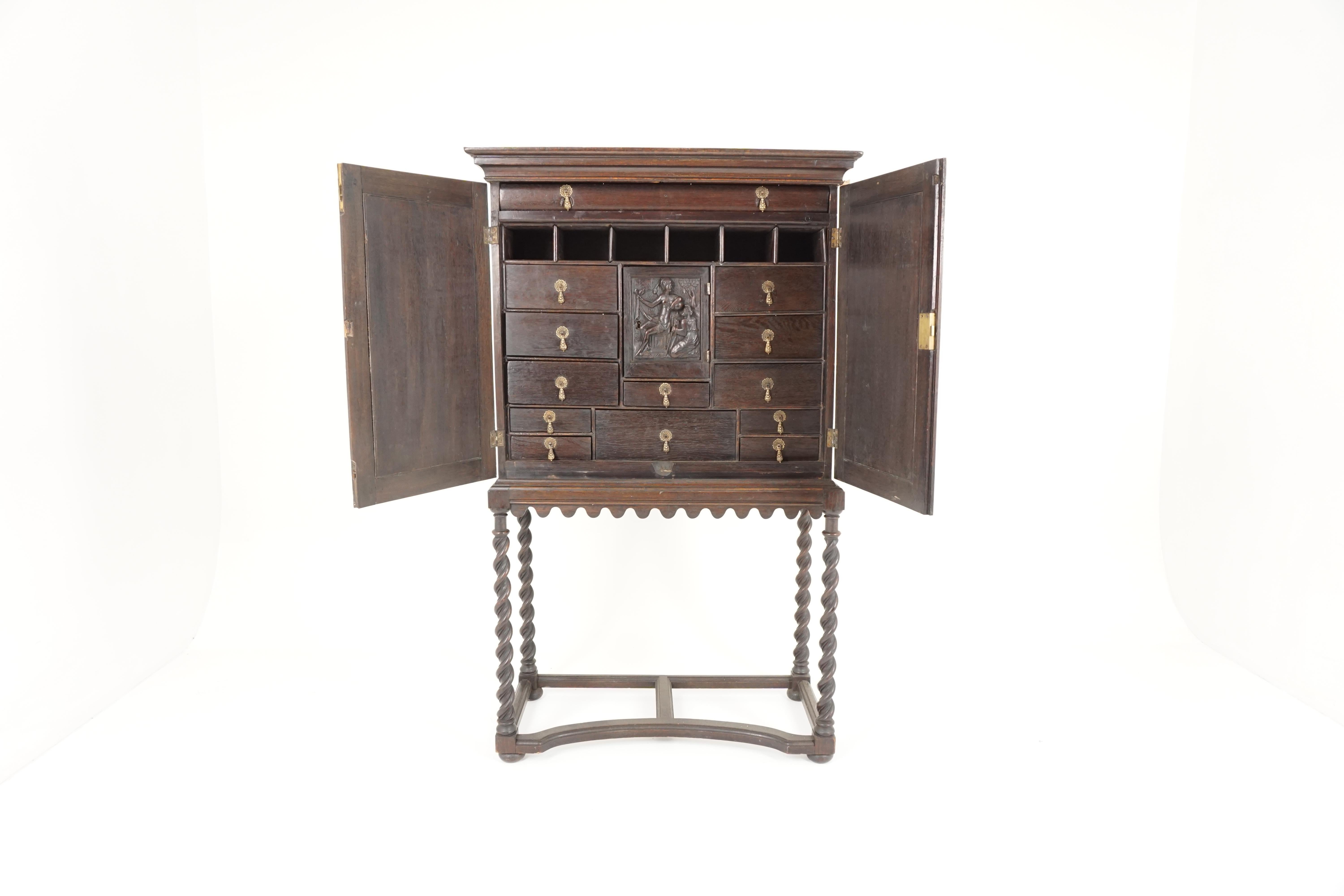 Antique Gothic Cabinet, Early 19th Century Carved Oak Collectors Cabinet on Stand, Antique Furniture, Scotland 1810, B1803

Scotland 1910
Solid Oak
Original Finish
Rectangular with Moulded Edge
Over a pair of Gothic Style Doors
Enclosing 13