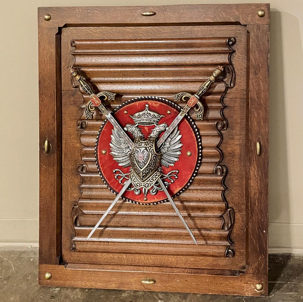 Antique Gothic display plaque with Swords & Double-Headed Eagle is an ideal choice to accessorize the masculine decor! The panel was rendered in solid oak, and features brass tacks around the otherwise unadorned frame encircling a linenfold panel