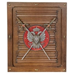 Ancienne plaque gothique avec épées et aigle à double tête