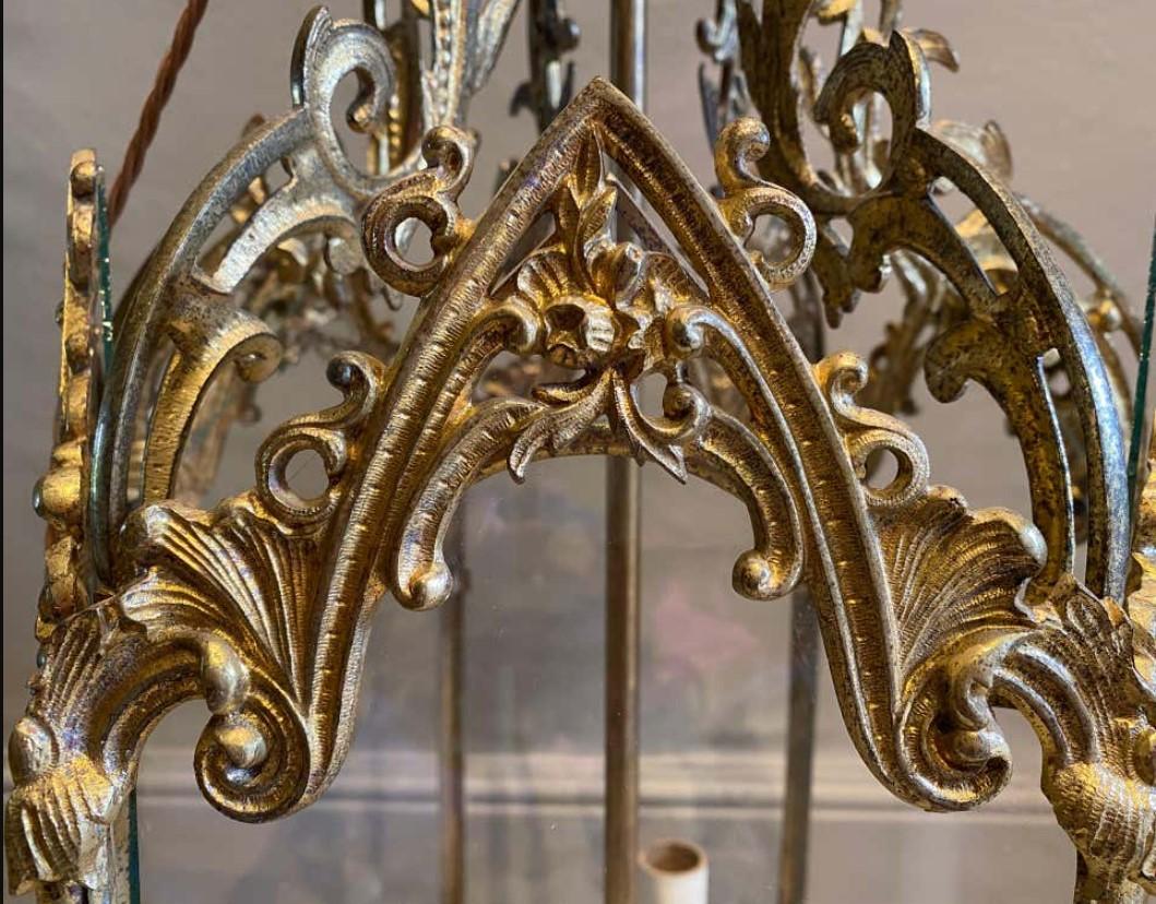 An English 19th-century Gothic gilt-bronze hall lantern.
George IV period, circa 1820-1830.

In superb condition. Later adapted with a 3-way center and wiring.

A very smart Georgian addition to a hallway, entry or foyer.

Measures:
H 2’3” (69 cm)
W