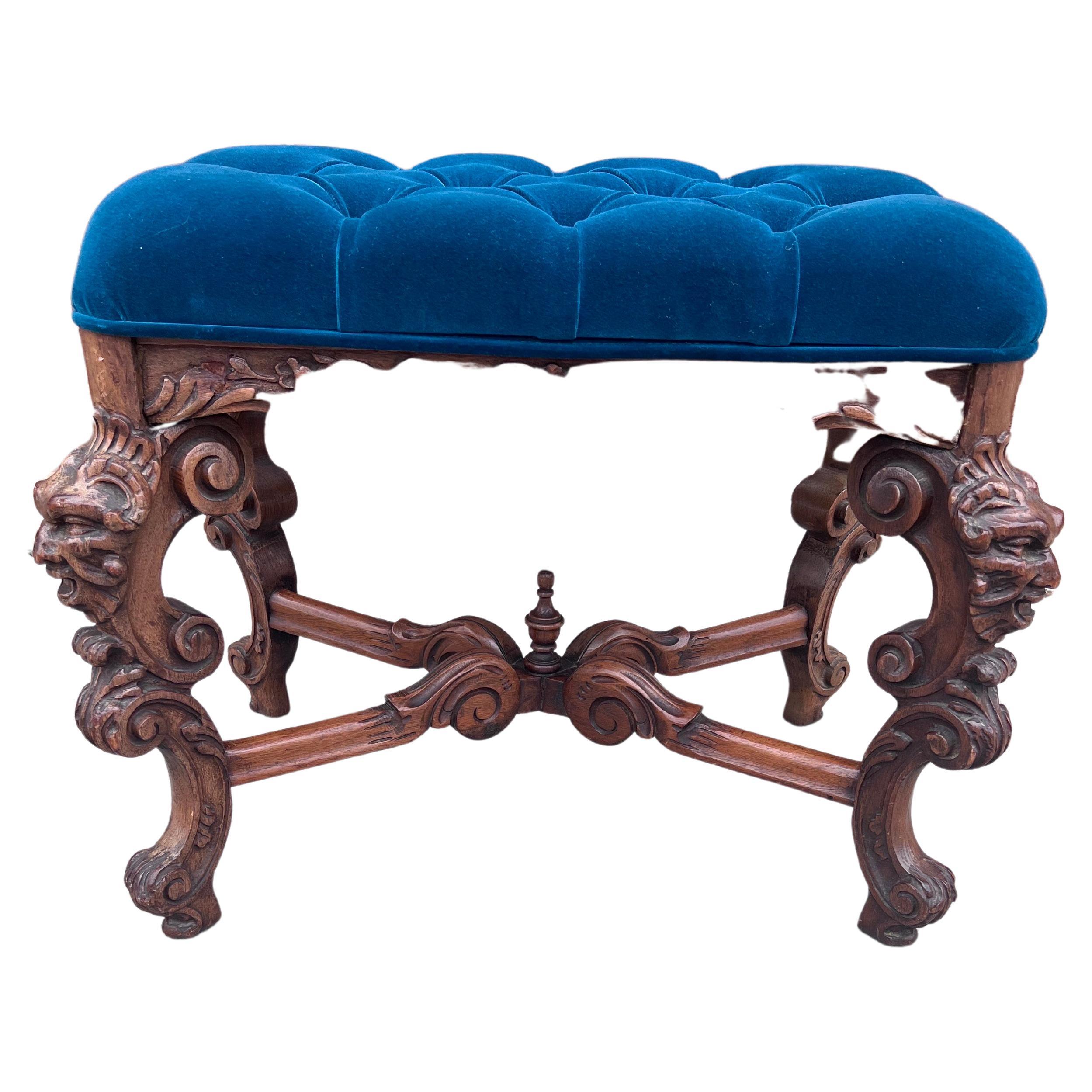 Antique Gothic Style Ornate Griffin Carved Ottoman Newly Upholstered in a High End Blue Velvet

Super cool antique ornate ottoman with a newly upholstered tufted blue velvet pillow top. The ottoman has griffin faces carved on all 4 legs. 

Circa