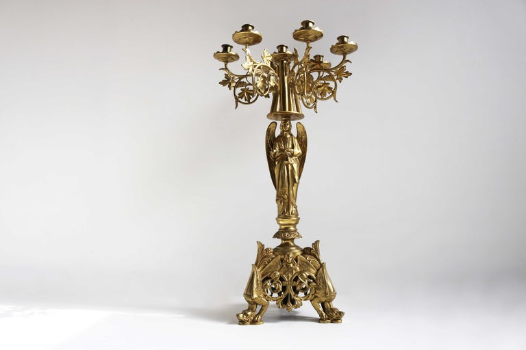 Antique Gothic Ornate brass plated candelabra, Angel, Altar candlestick 

Gorgeous antique late 19th century tall brass altar / church candlestick, France, 1875
A beautifully detailed candlestick, richly decorated.
Full of candles an impressive
