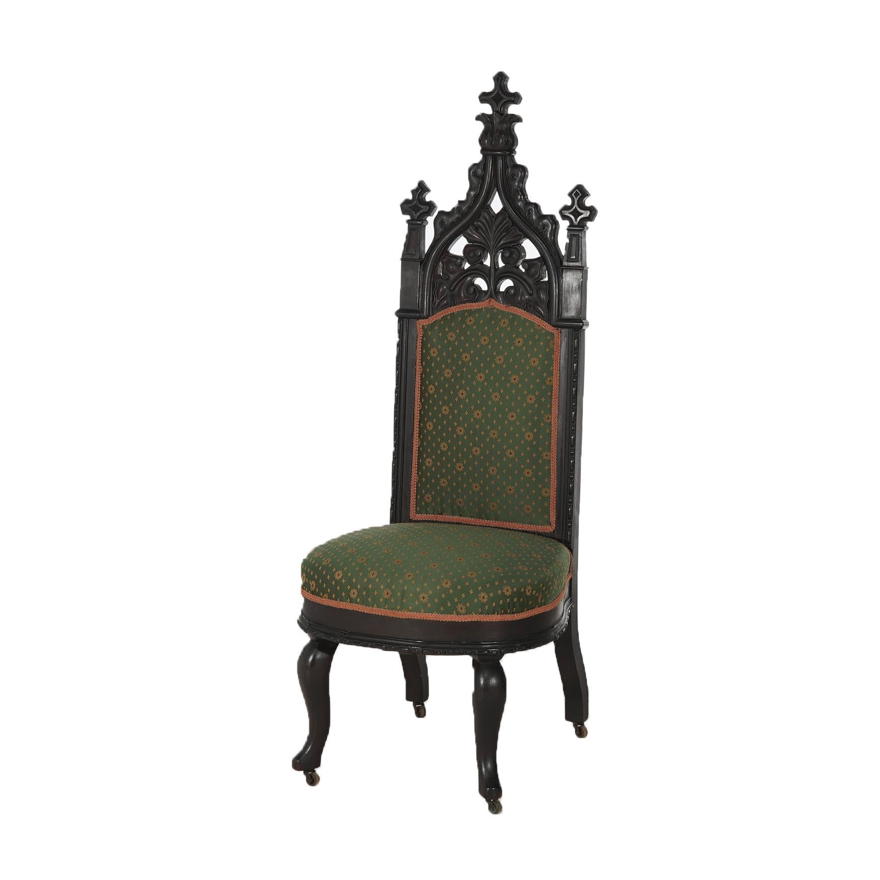 ***Ask About Reduced In-House Delivery Rates - Reliable Professional Service & Fully Insured***

Antique Gothic Revival Ebonized & Foliate Carved Walnut Upholstered Throne Chair C1860

Measures - 51.5