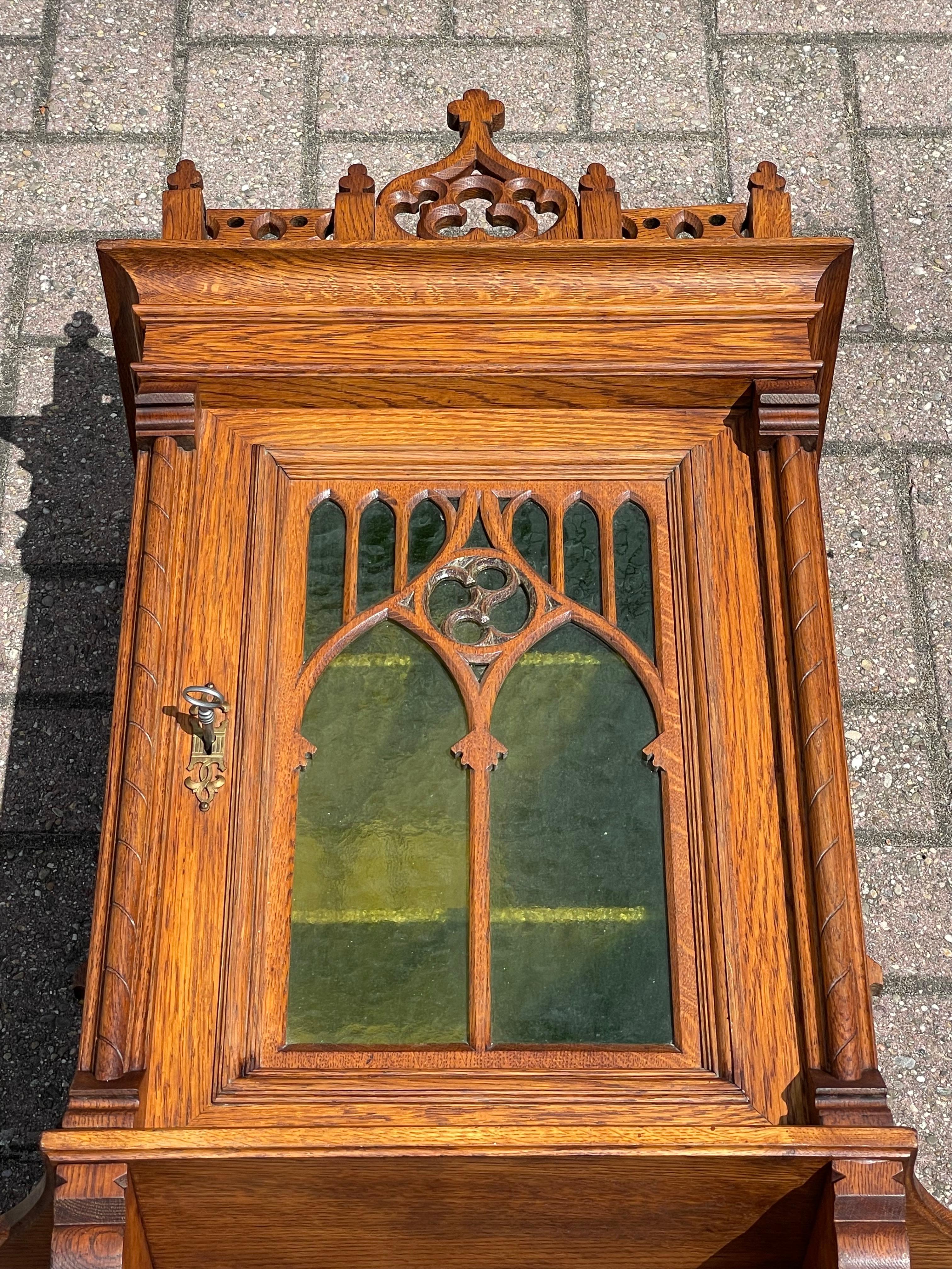 Antique Gothic Revival Hand Carved Oak Wall Cabinet with Green Cathedral Glass For Sale 8