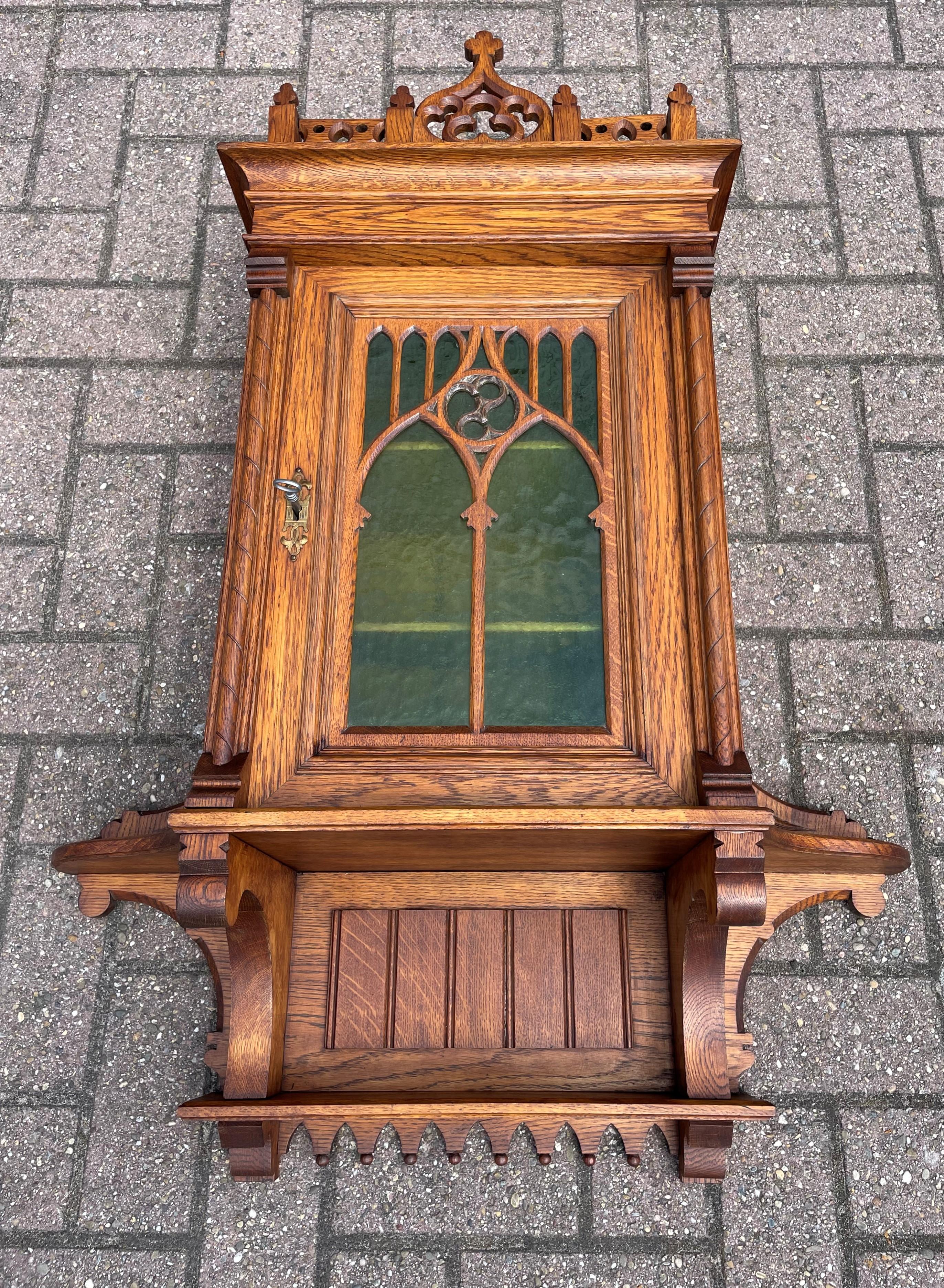 Antique Gothic Revival Hand Carved Oak Wall Cabinet with Green Cathedral Glass For Sale 9