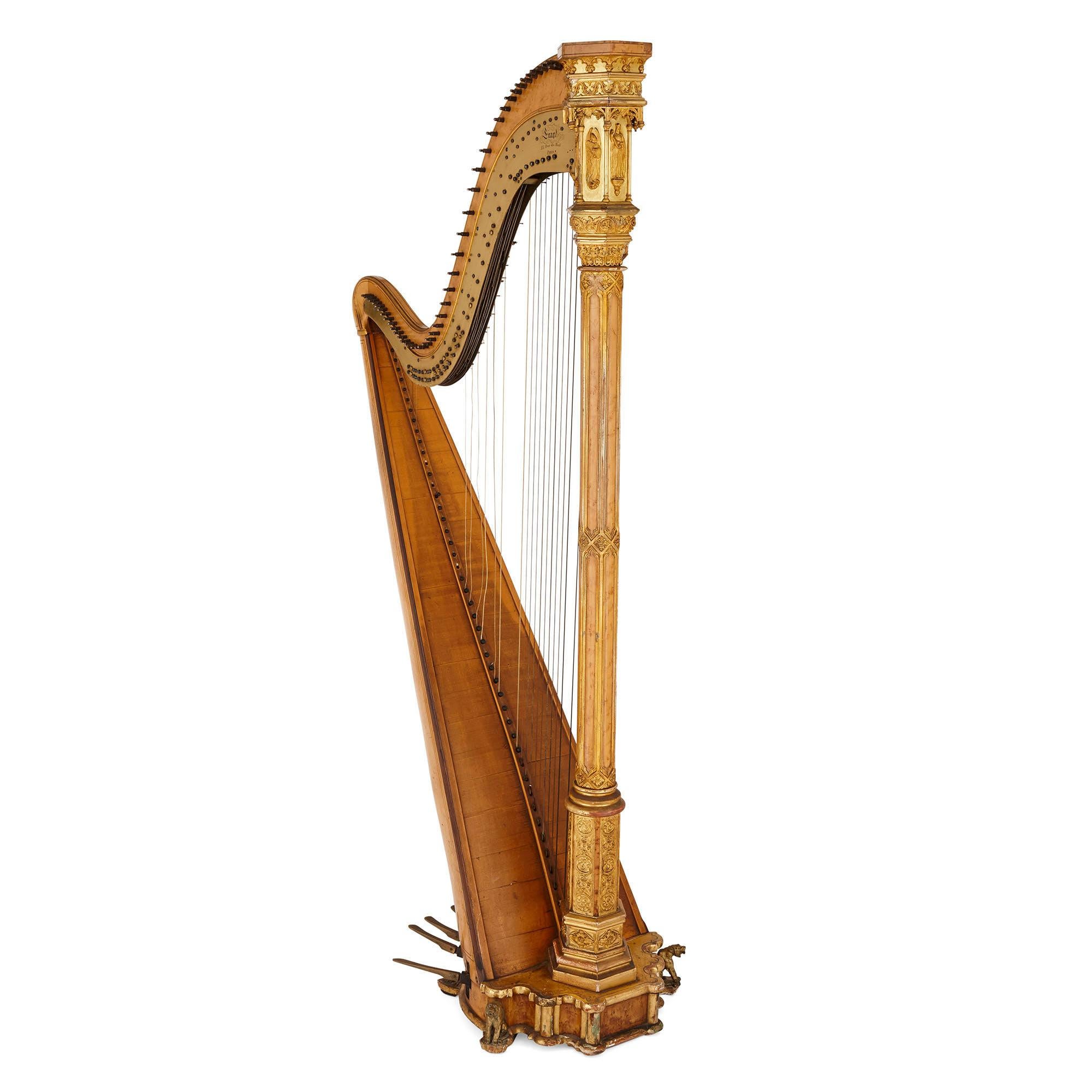 Antique Gothic Revival harp by Erard
French, circa 1840
Measures: Height 178cm, width 54cm, depth 91cm

Of typical form by the famed instrument maker Érard. With gilt highlights and set on four short feet, the front two as seated tigers.