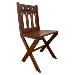 Antique Gothic Revival Oak X-Frame Accent Chair.