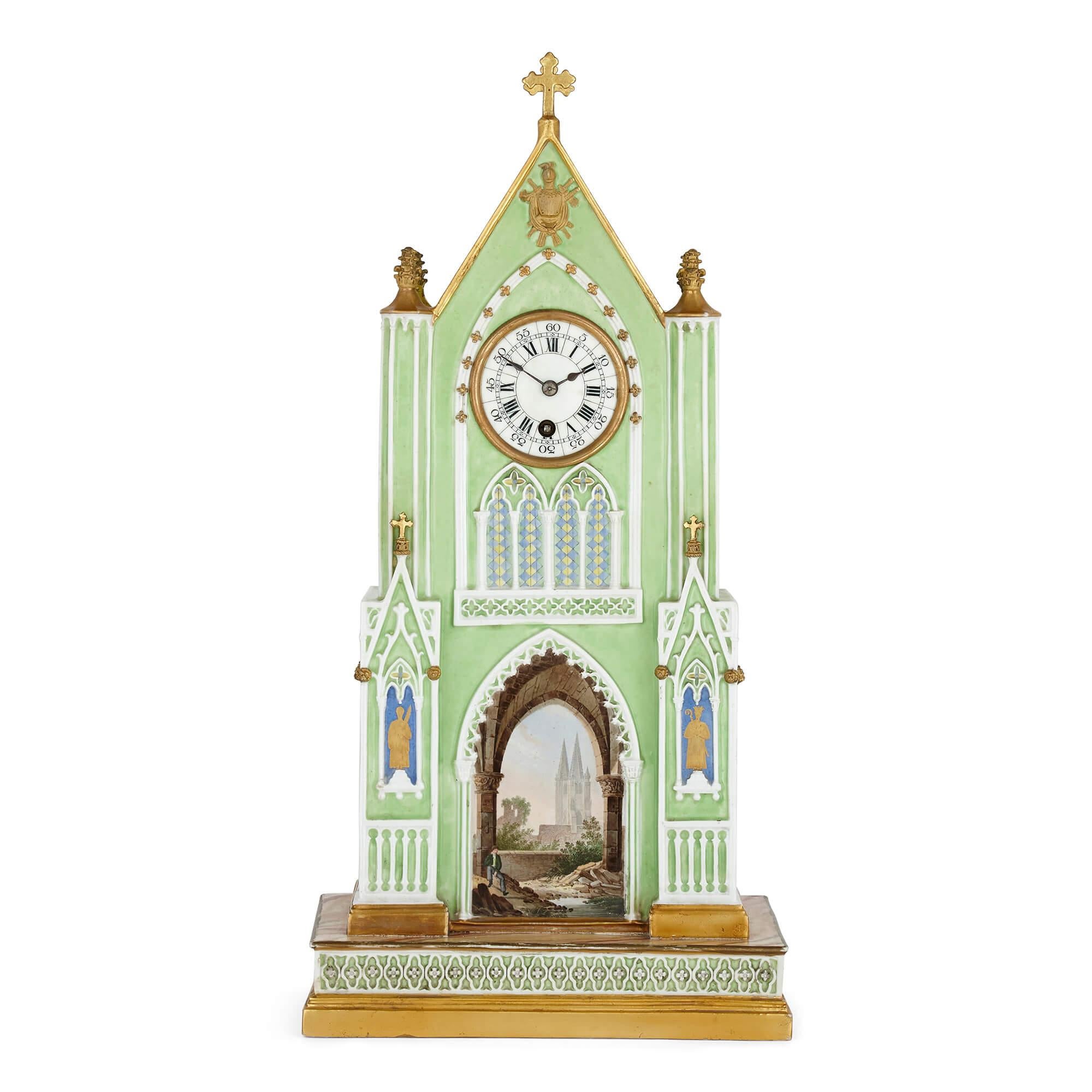 Antique Gothic Revival porcelain clock by Dagoty & Honoré
French, c. 1830
Measures: Height 51cm, width 25.5cm, depth 17cm

This beautiful Gothic Revival style porcelain clock was made by the prestigious French firm Dagoty and Honoré, founded by