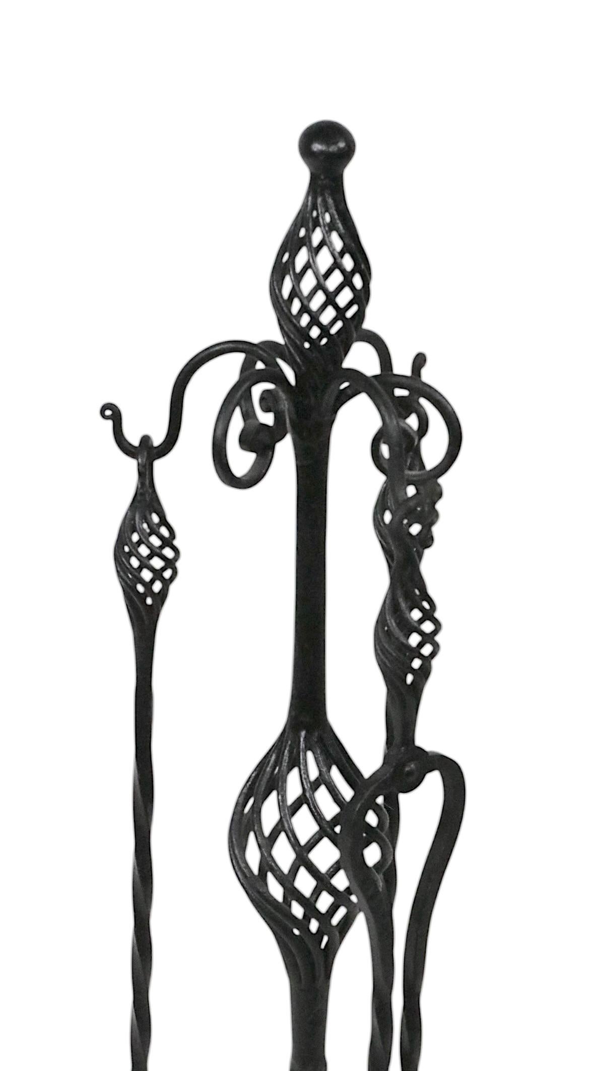Antique Gothic Revival Style Four Piece Wrought Iron Fireplace Tool Set In Good Condition For Sale In New York, NY