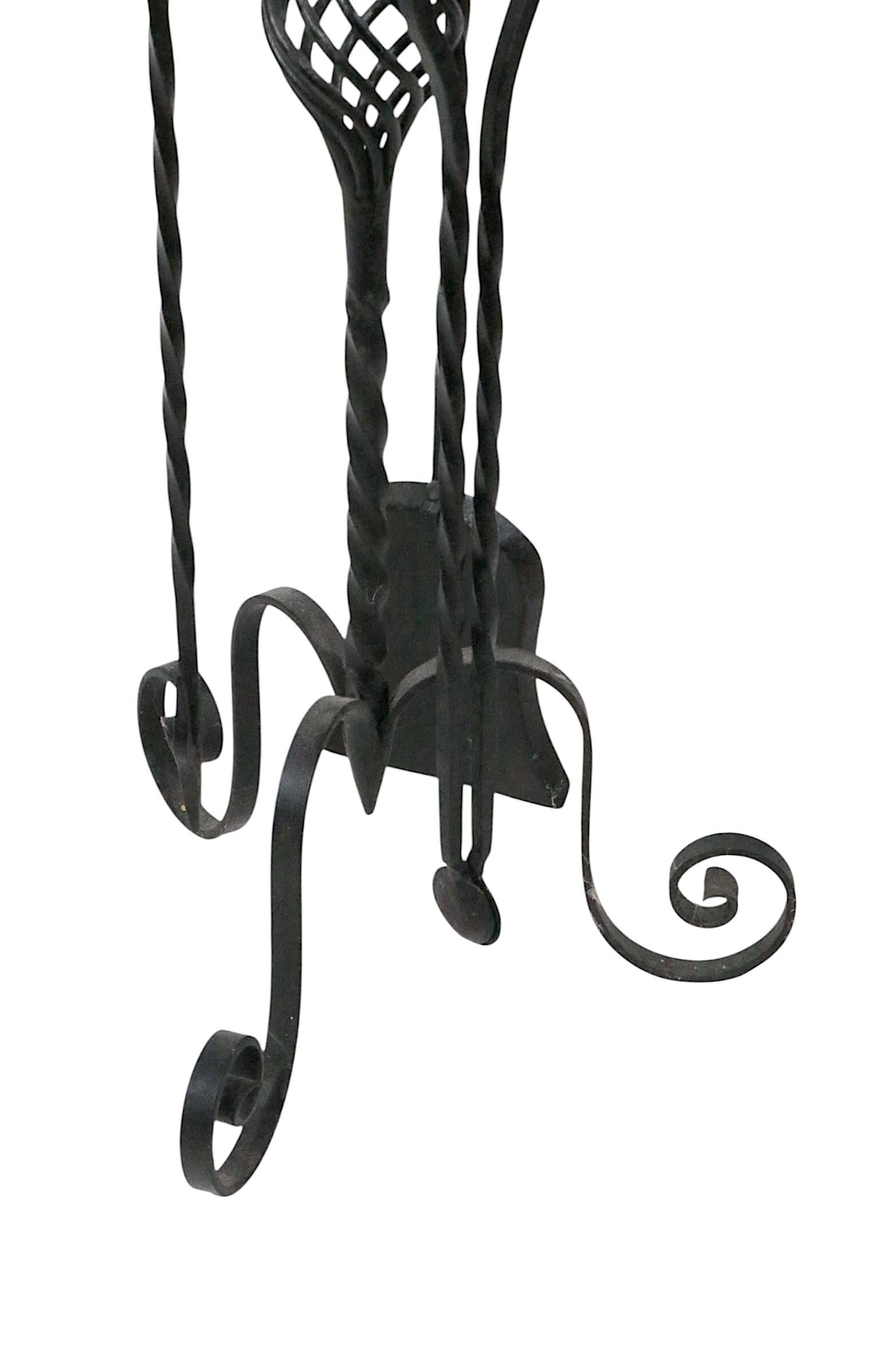 Antique Gothic Revival Style Four Piece Wrought Iron Fireplace Tool Set For Sale 1