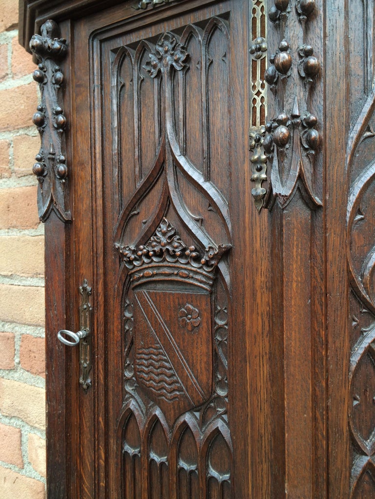 Antique Gothic Revival Wall and Key Cabinet W. Hand Carved Church Windows and Guard at 1stdibs