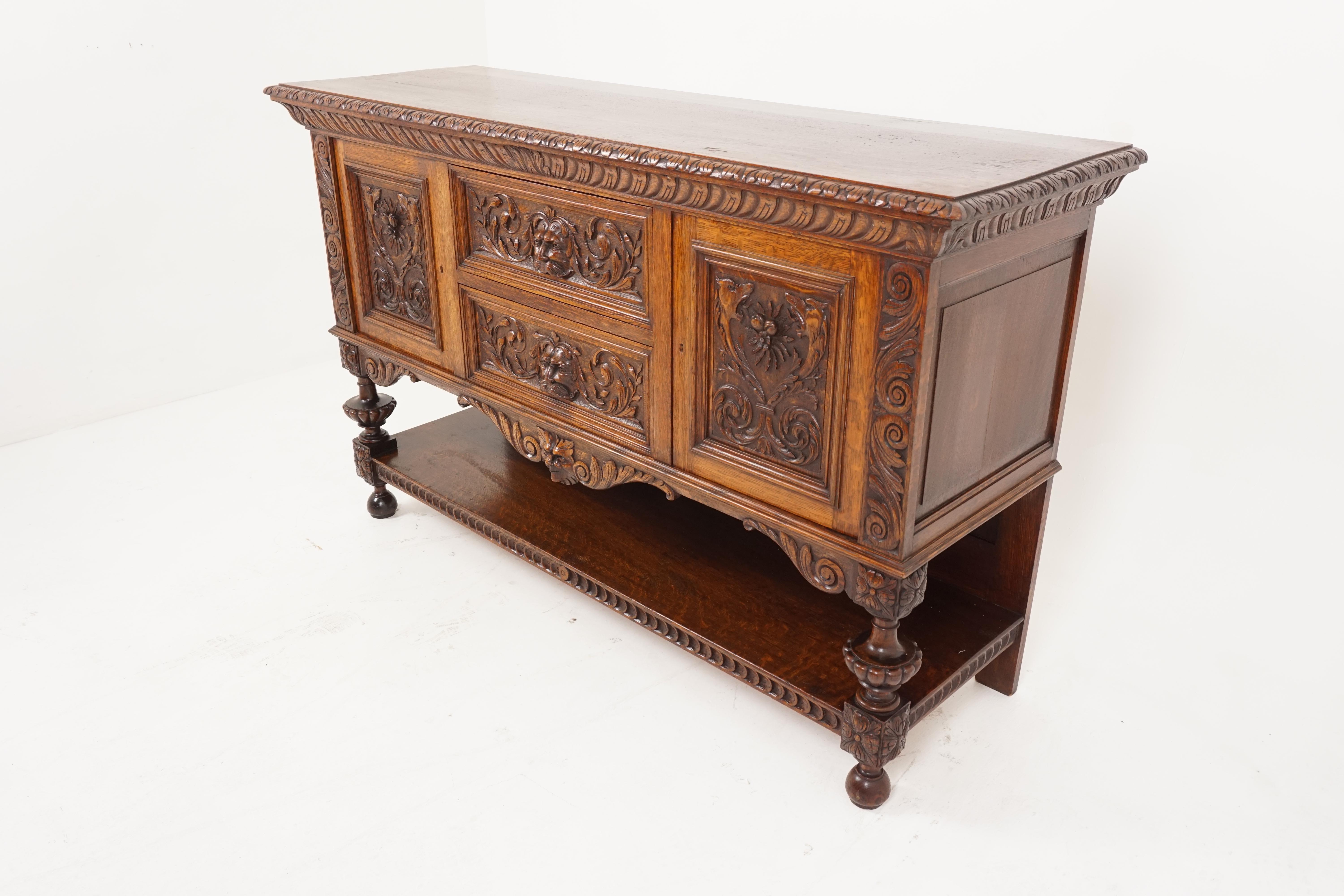 Antique Gothic sideboard, carved oak, green man buffet, Scotland 1880, B2695

Scotland 1880
Solid oak 
Original finish
Rectangular moulded top with a deep carved border
Pair of drawers with carved green man handles
Flanked by a pair of carved