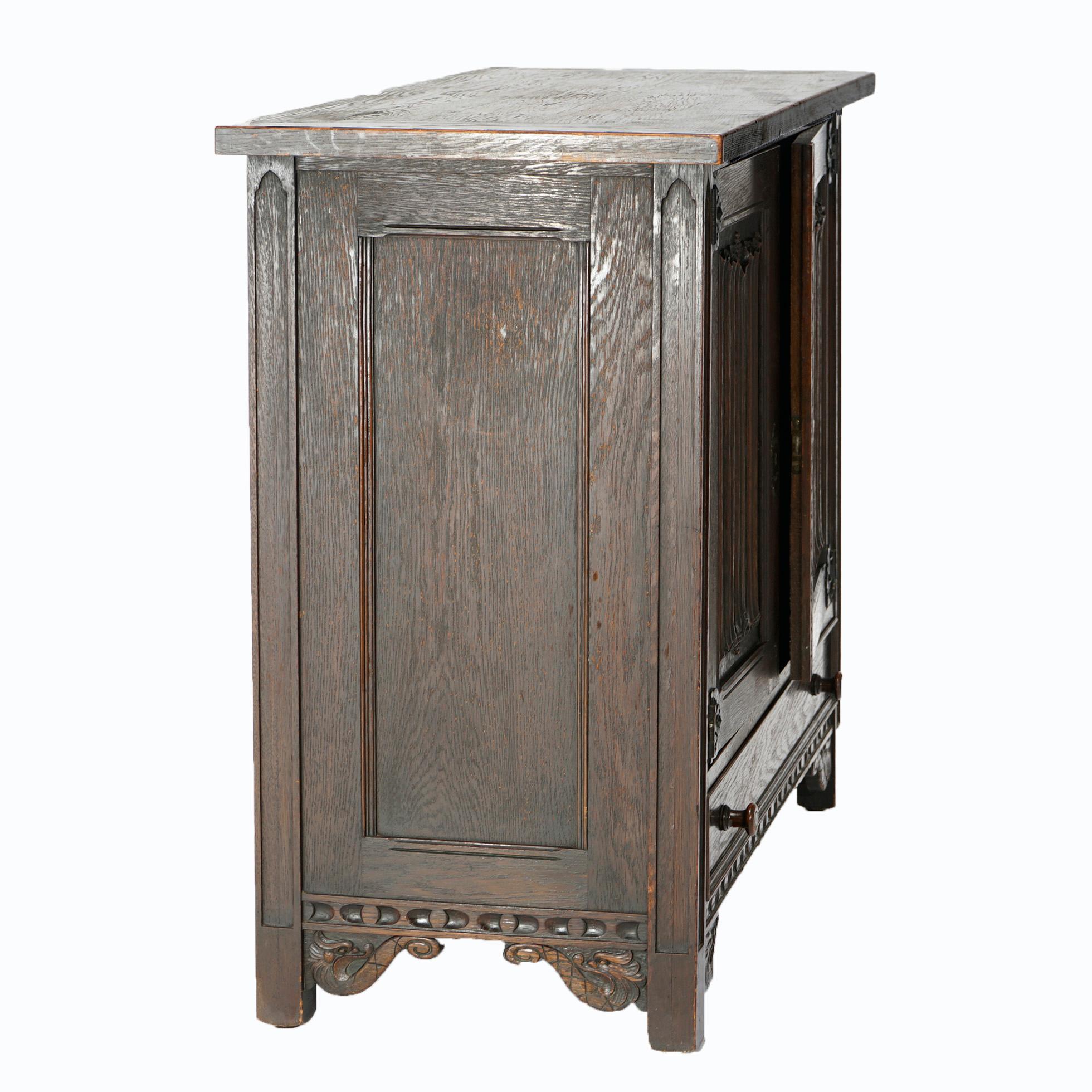 American Antique Gothic Style Figural Carved English Oak Linen Fold Design Credenza c1910