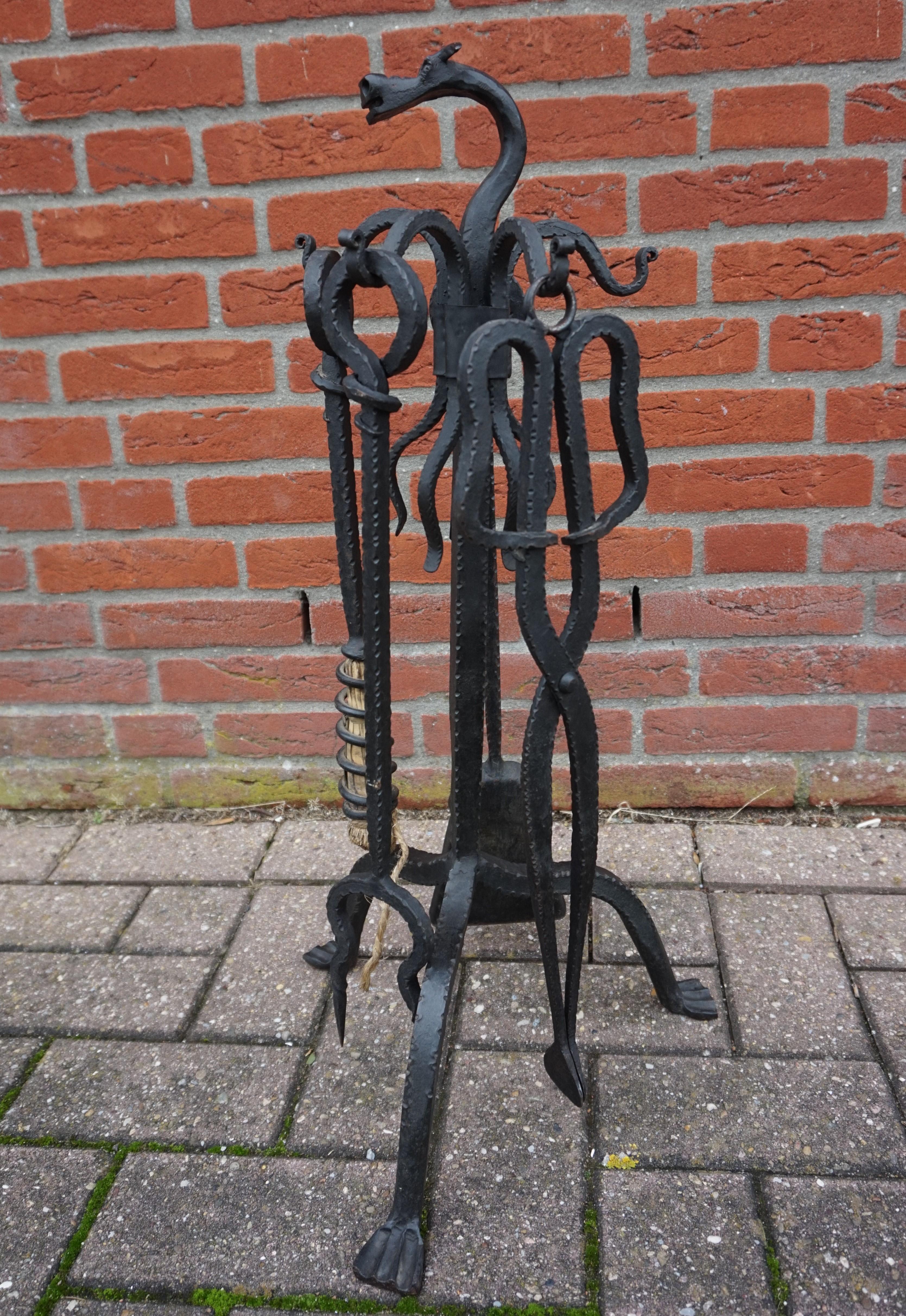 This artistic and practical wrought iron fire set will help manage the fire in your fireplace.

If you are passionate about artistic and handcrafted antiques than this fireplace set from the Arts & Crafts era could be yours to own and enjoy soon.
