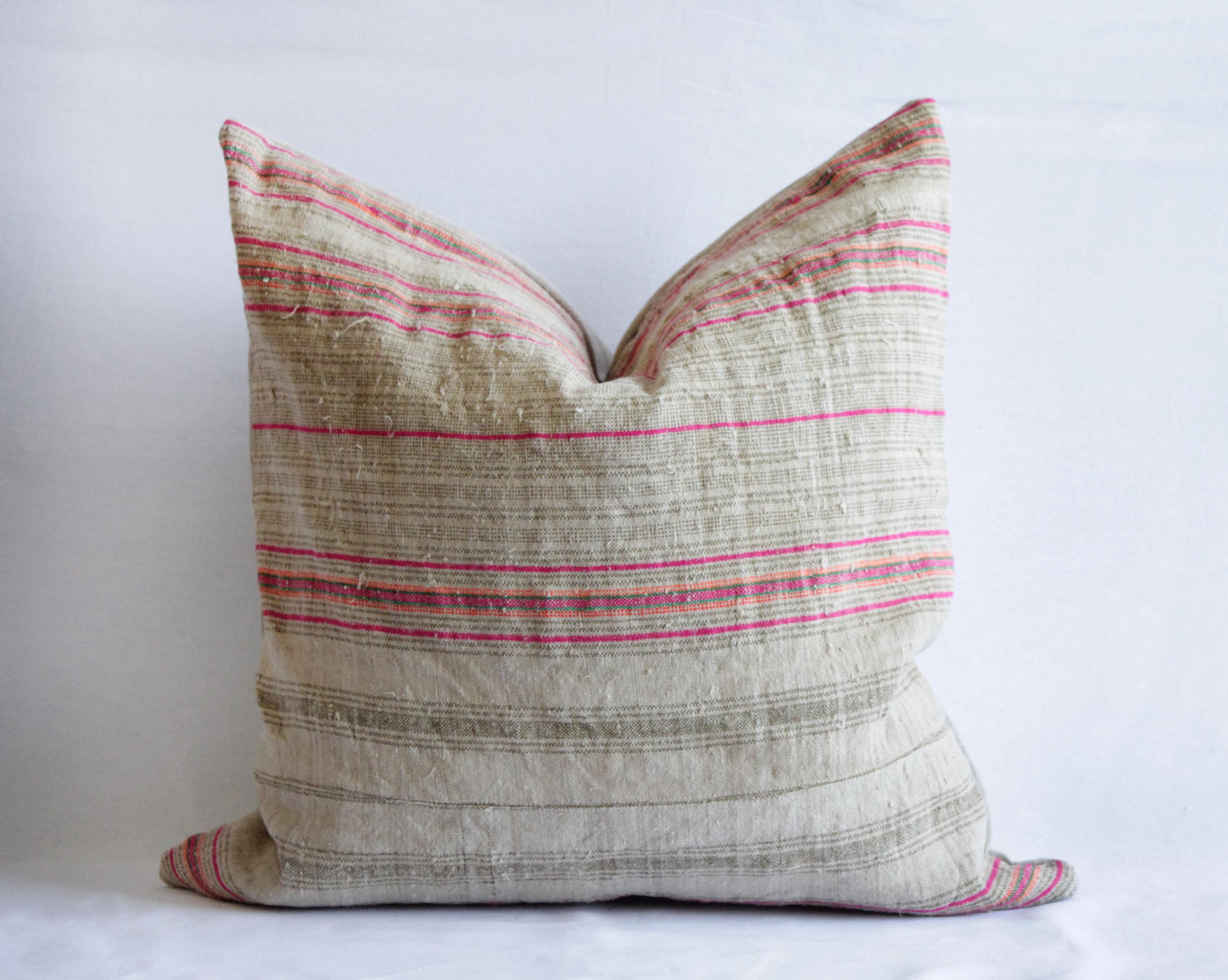 Antique grainsack linen stripe pillows in natural tones with pink stripes.
This custom made pillow is made by Full Bloom Cottage from antique and vintage textiles, finished with a natural Belgian linen flax backing and hidden zipper on the bottom.