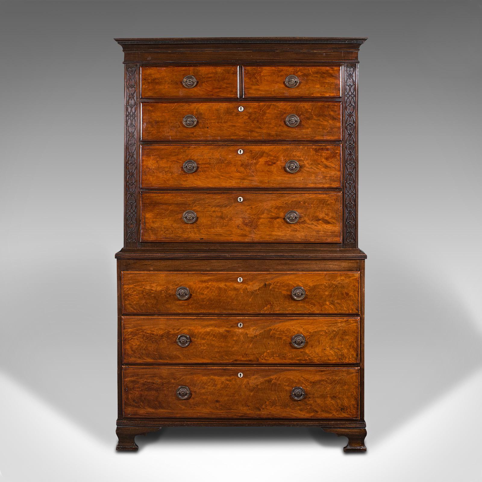 This is an antique grand chest on chest of drawers. An English, walnut and mahogany tallboy, dating to the Georgian period, circa 1800.

Striking appearance and of superior craftsmanship
Displays a desirable aged patina and in good order
Dashing