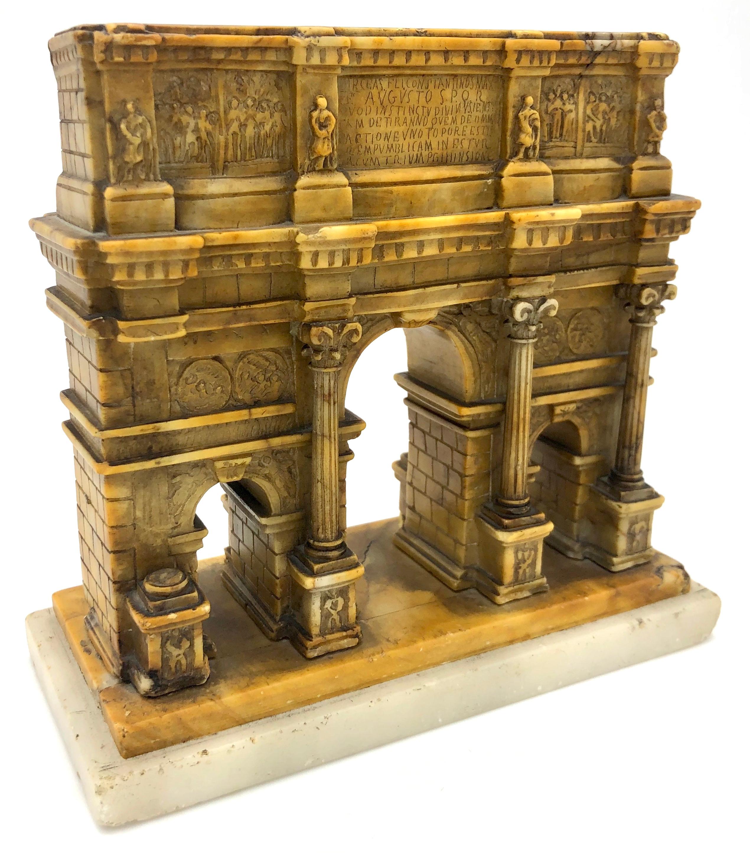 The Arch of Constantine is a miniature version of the famous arch in honour of Constantine' triumph in Rome and a fine example of a quality grand tour souvenir. The alabaster carving was executed in a roman workshop in the second half of the