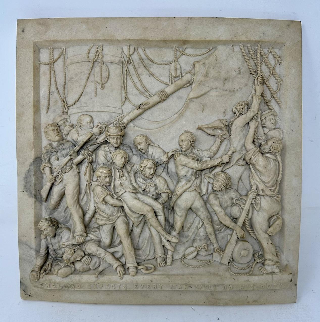 Superb and quite rare example of an exquisitely hand carved in really seldom seen high relief rectangular Marble Plaque depicting the “Battle of Trafalgar” scene of generous size, early Nineteenth Century, dated 1805 

Inscription at bottom “ENGLAND