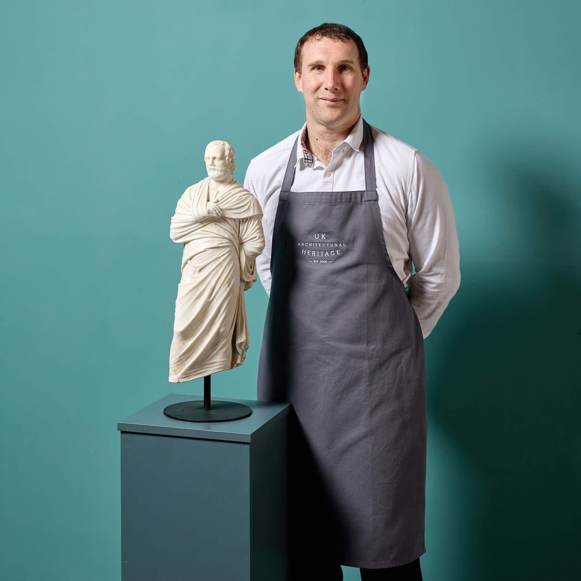 An antique Grand Tour style fragmentary white statuary marble sculpture of Aeschines, ancient Greek statesman and orator born in the 3rd century BC.

Displayed on a modern steel stand, this sculpture is expertly carved, from the robes to the facial