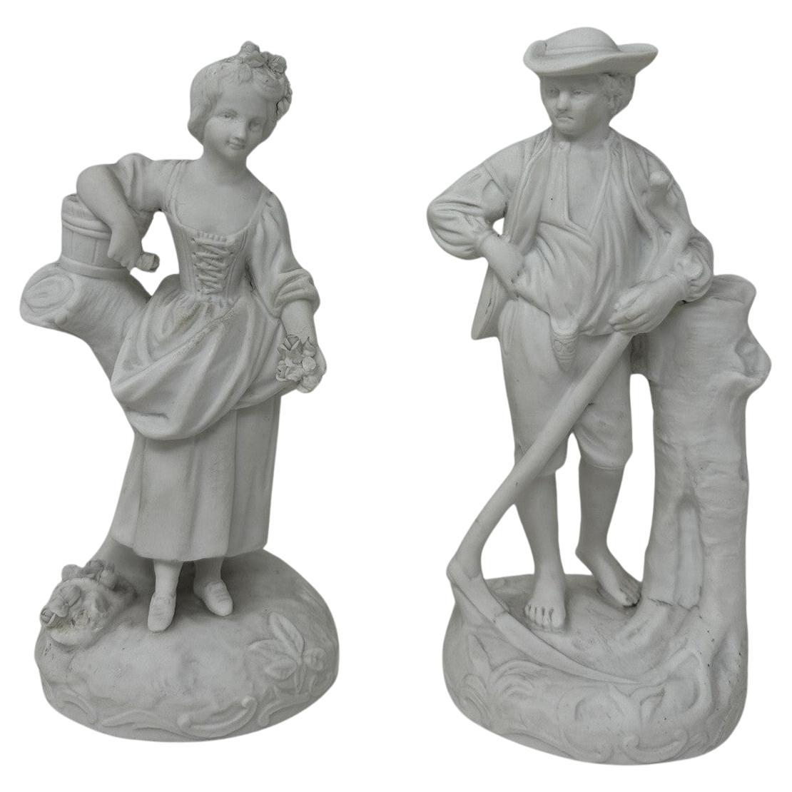 Stunning French Grand Tour Parian Bisque Group depicting a male and female standing figures, mid to late Nineteenth Century. 

The male Farmer in period dress holding an agricultural Scythe, leaning against a tree stump on a naturalistic circular