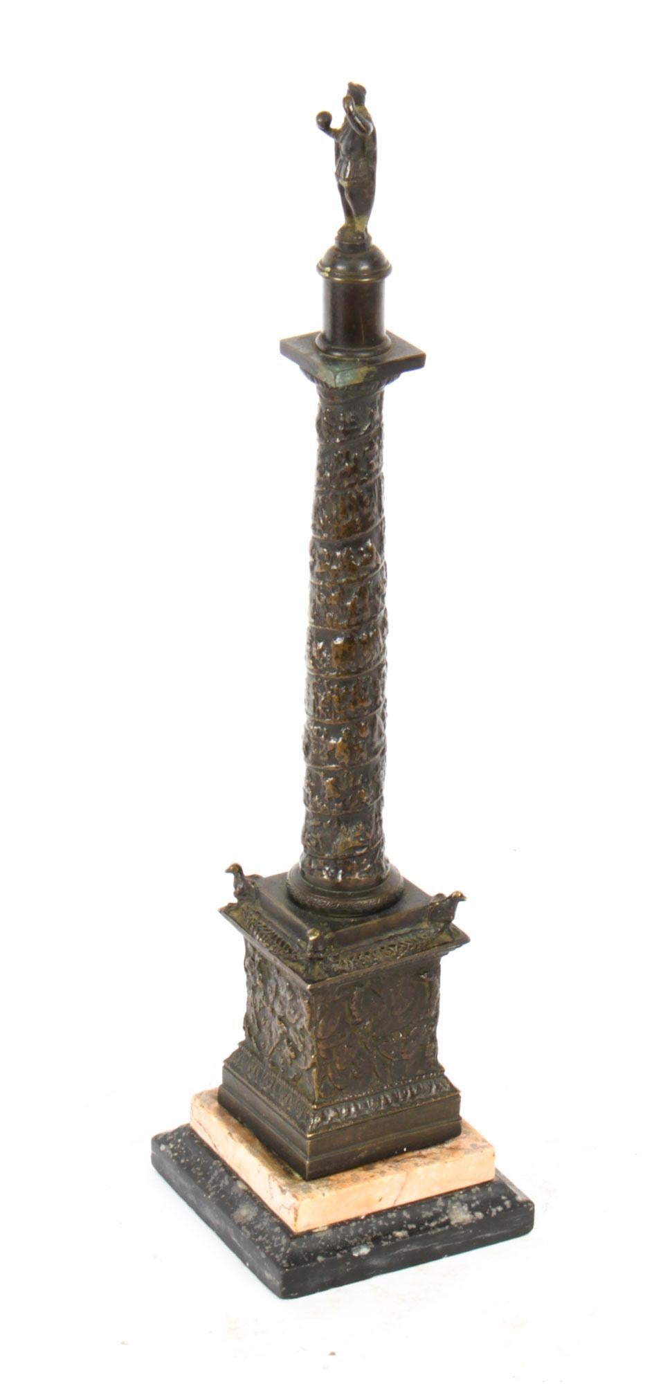 This is a wonderful antique Grand Tour patinated bronze model of Trajan's Column, circa 1820 in date.
 
This splendid bronze with the relief cast stem and panelled plinth above a stepped Siena and black marble base
 
The spiralling column is